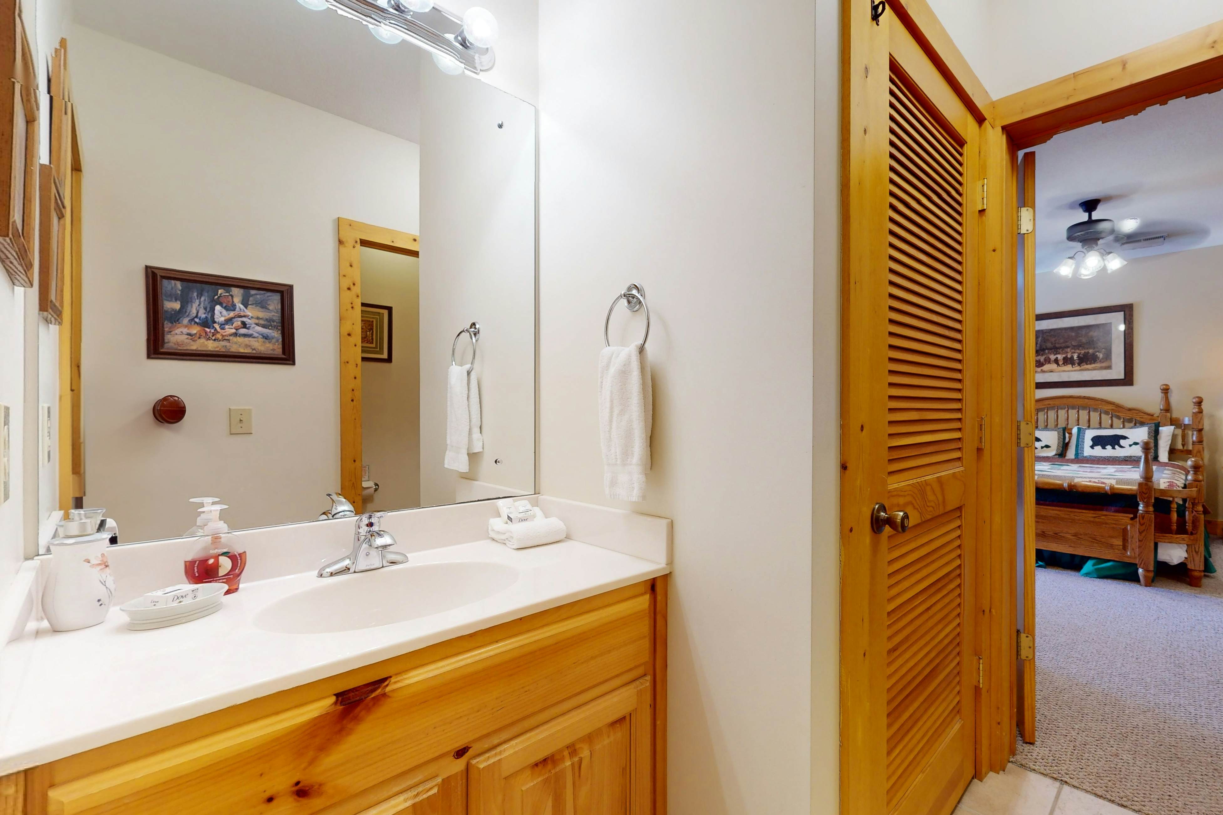 Mtn-view cabin with game room, private hot tub, pool, & free attraction tickets