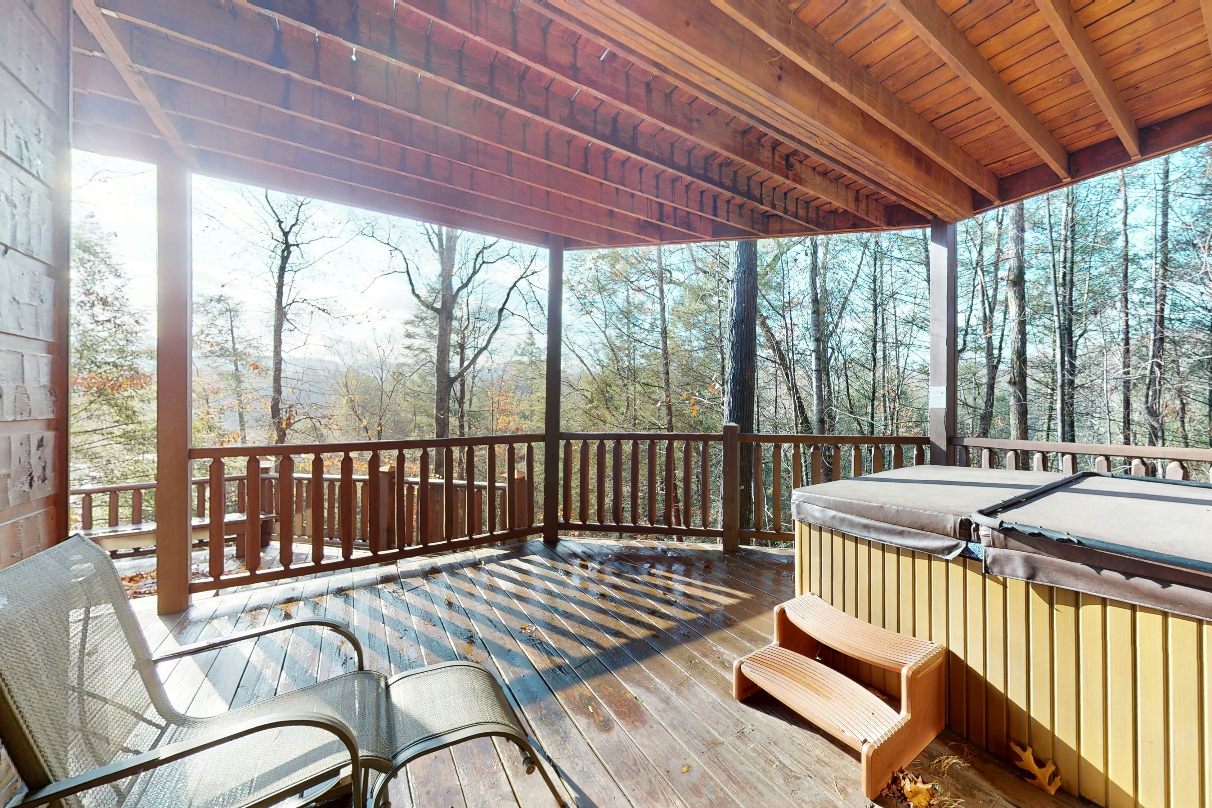 Mtn-view cabin with game room, private hot tub, pool, & free attraction tickets