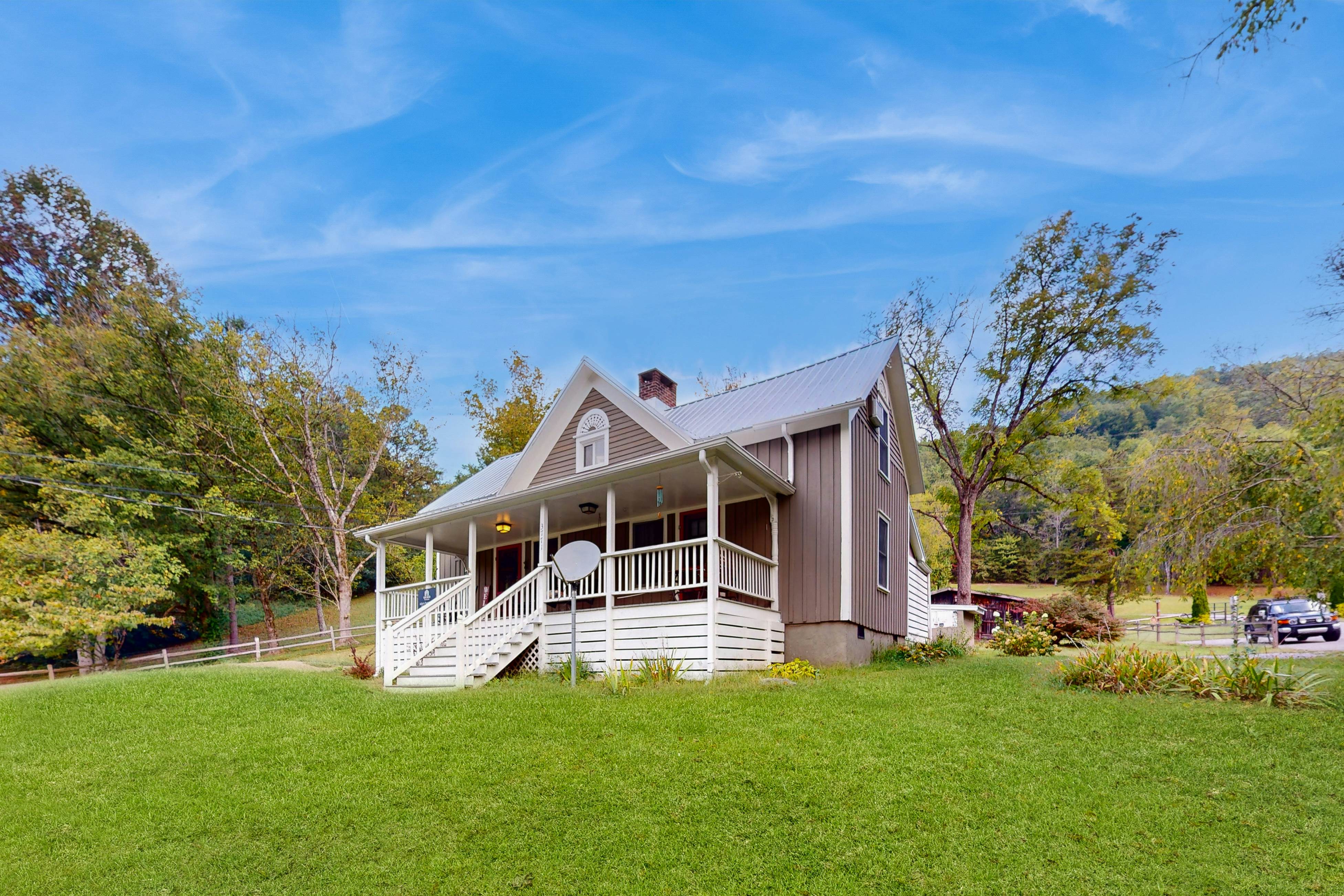 Classic farmhouse-style home w/ front porch, hot tub, & free attraction tickets