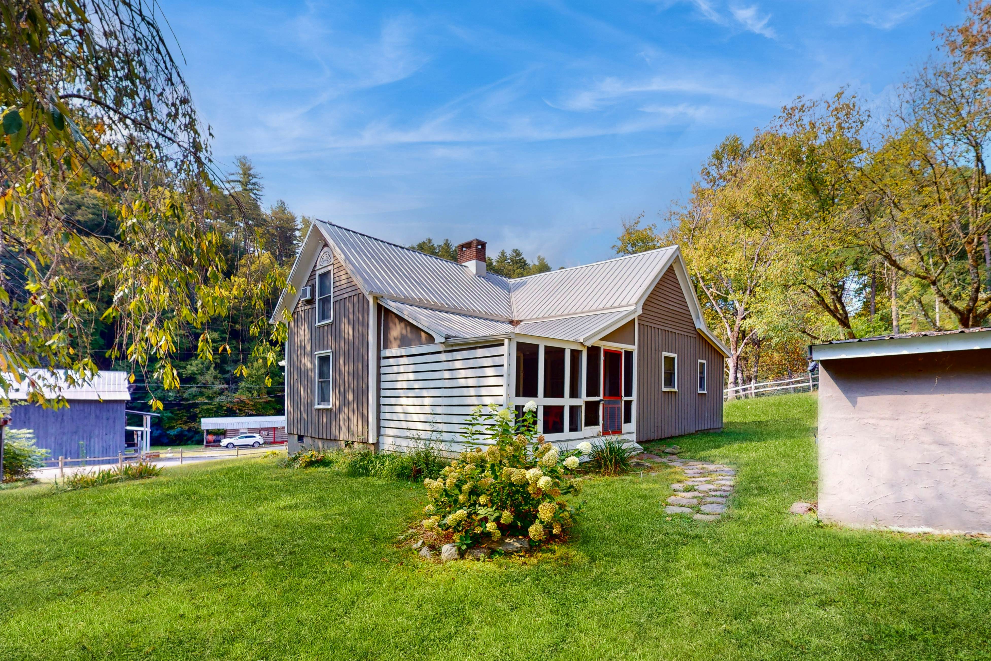 Classic farmhouse-style home w/ front porch, hot tub, & free attraction tickets