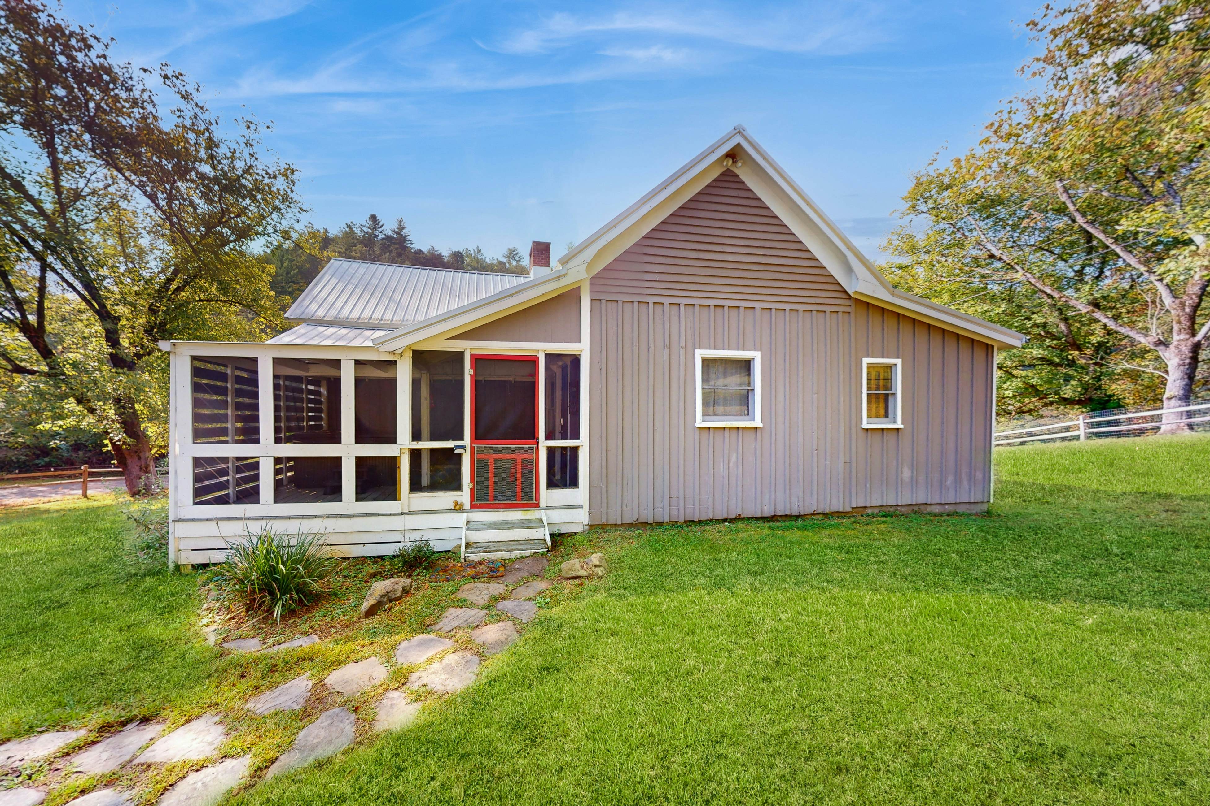 Classic farmhouse-style home w/ front porch, hot tub, & free attraction tickets