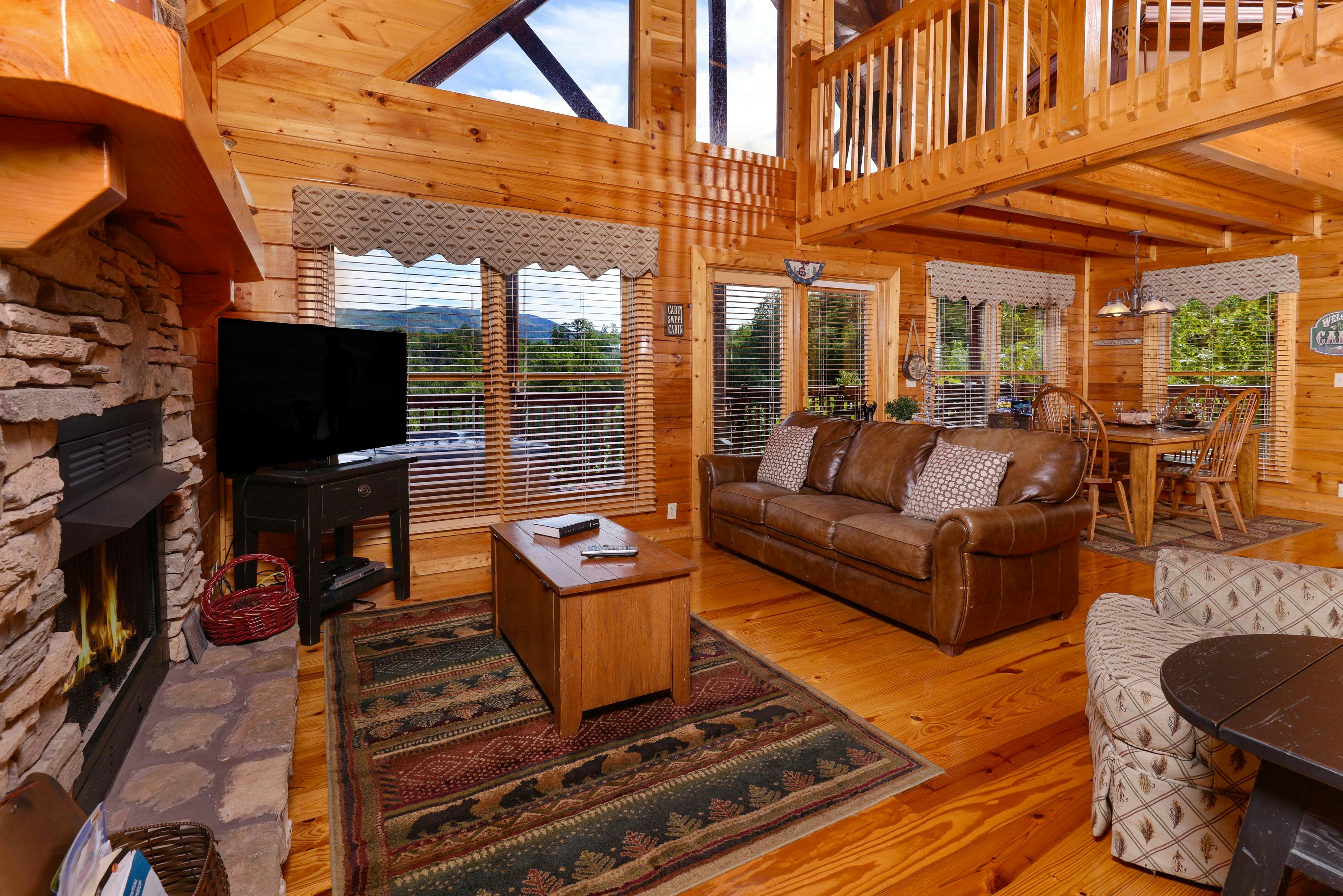 Scenic log cabin with hot tub, balcony, Free Attraction Tickets, & pool table