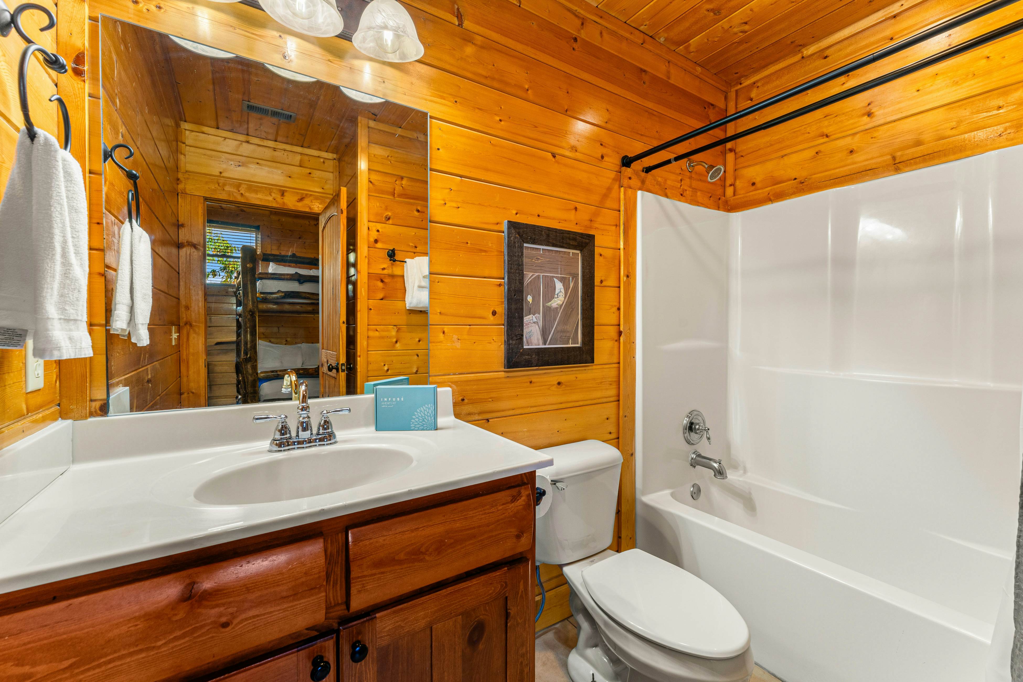 Amazing cabin sleeping 58 w/dual 7-person hot tubs, billiards, theater - attraction tickets!