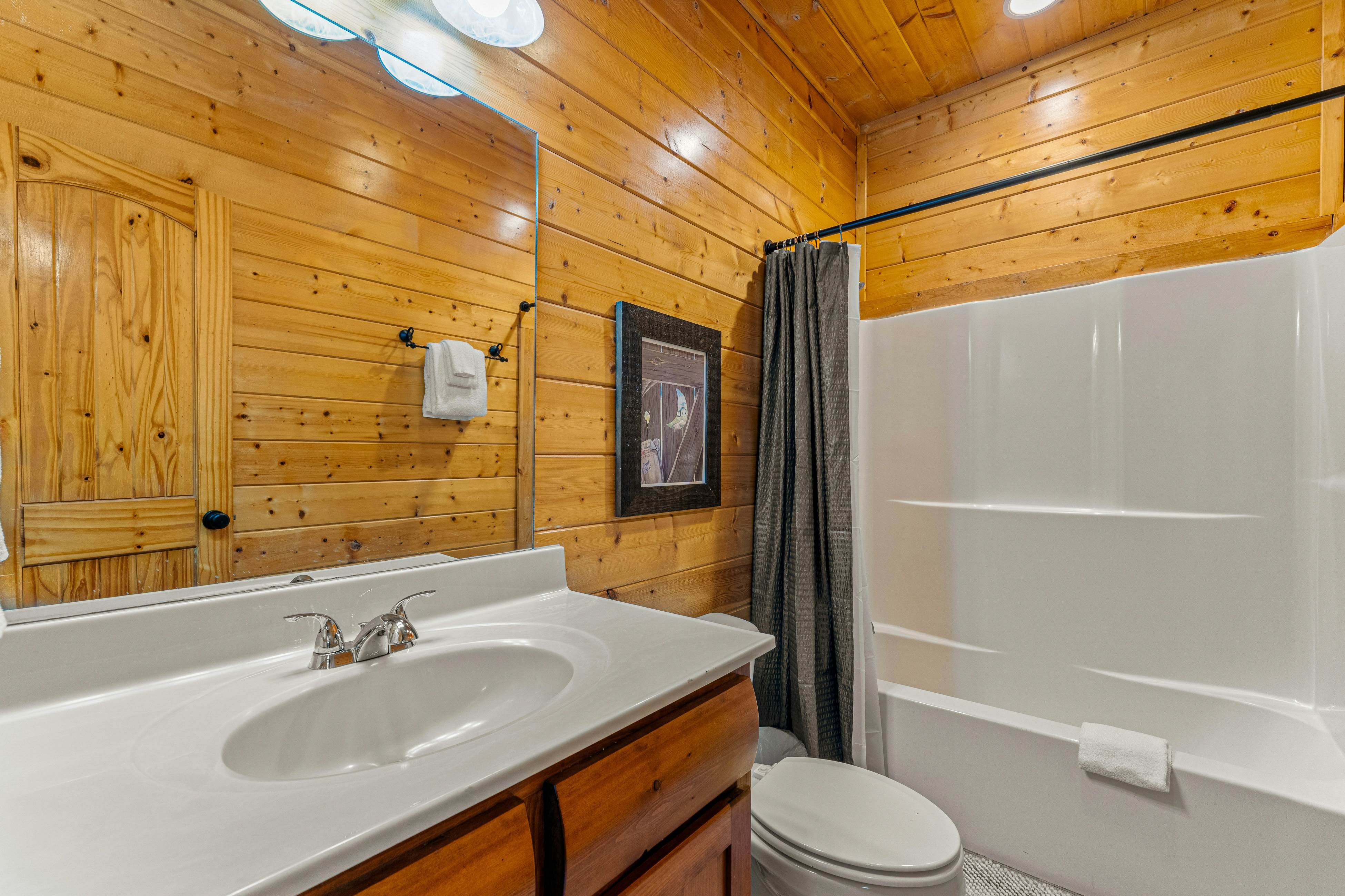 Amazing cabin sleeping 58 w/dual 7-person hot tubs, billiards, theater - attraction tickets!