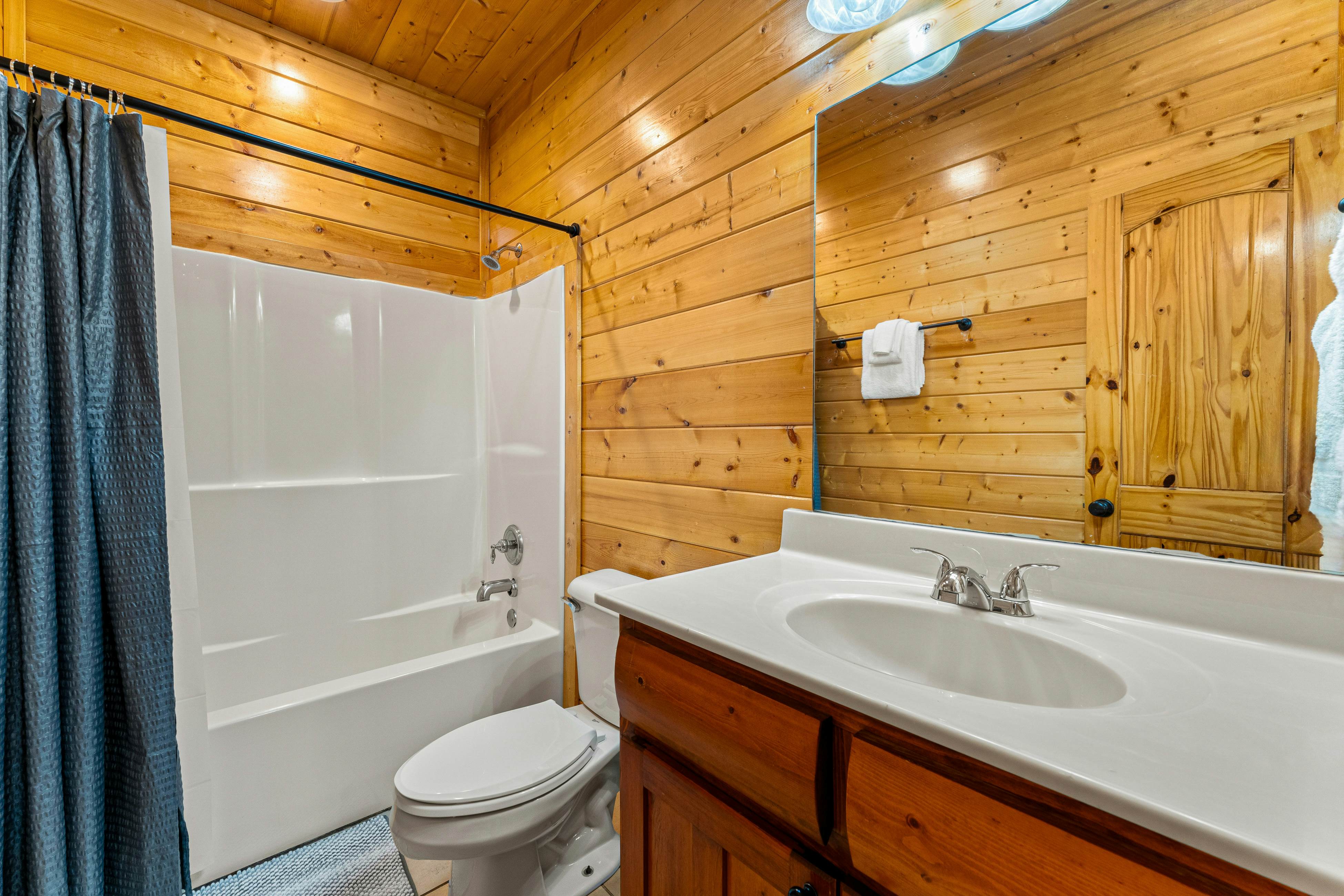 Amazing cabin sleeping 58 w/dual 7-person hot tubs, billiards, theater - attraction tickets!