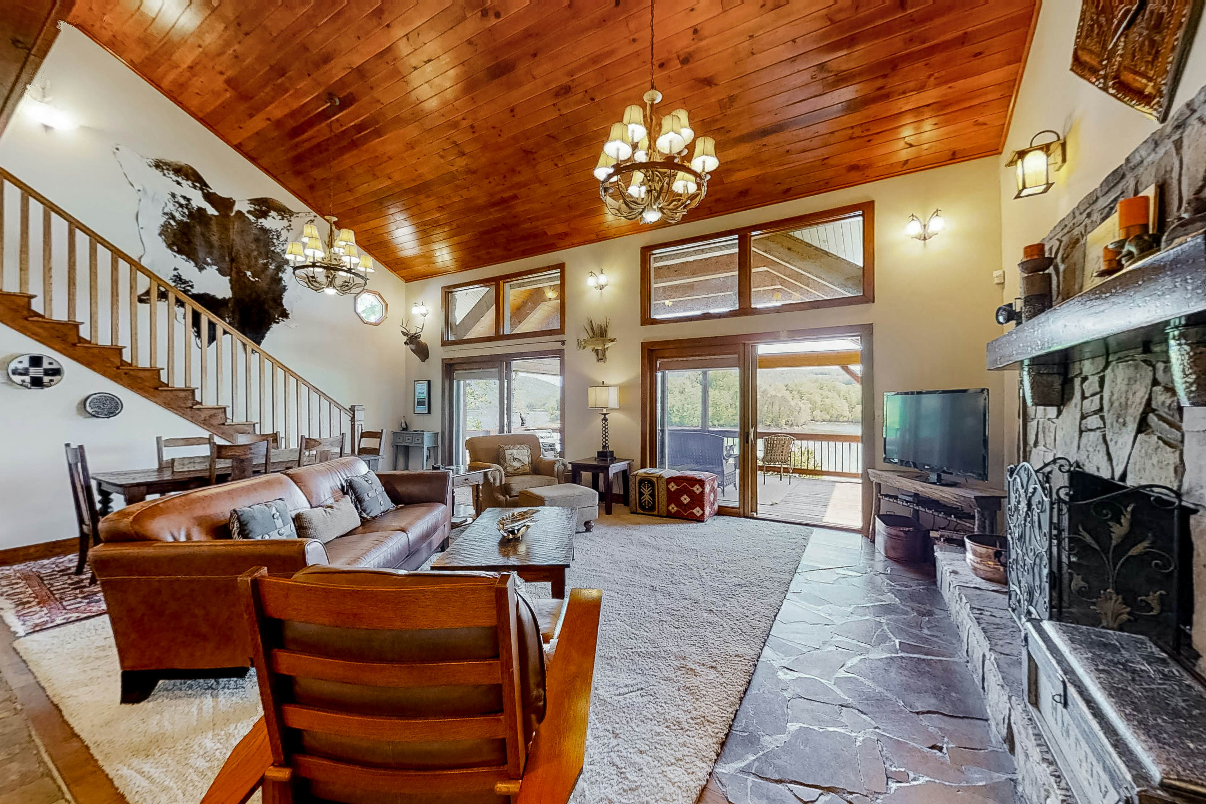 Lakefront home with amazing views, grill, fire pit, private dock, & AC