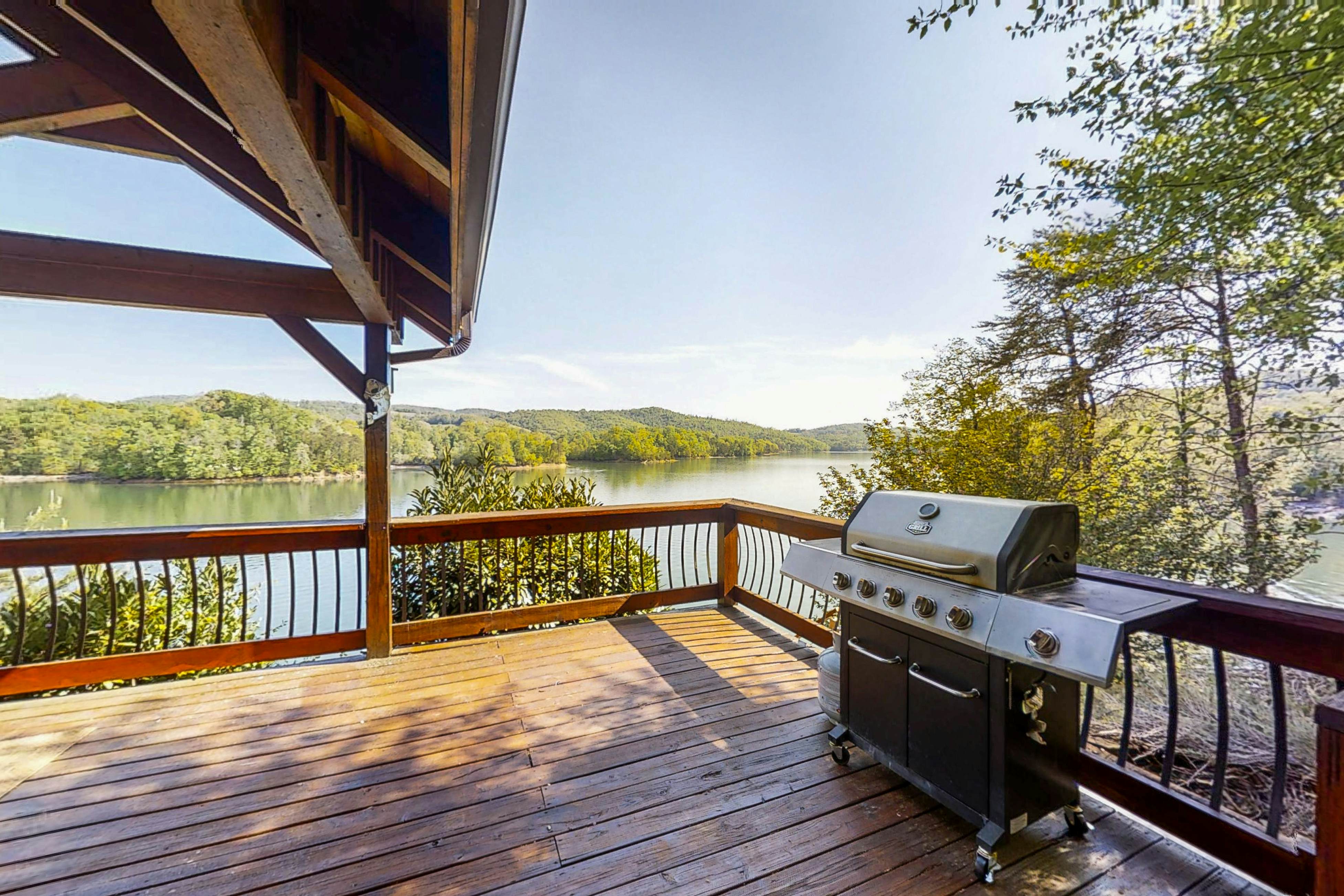 Lakefront home with amazing views, grill, fire pit, private dock, & AC