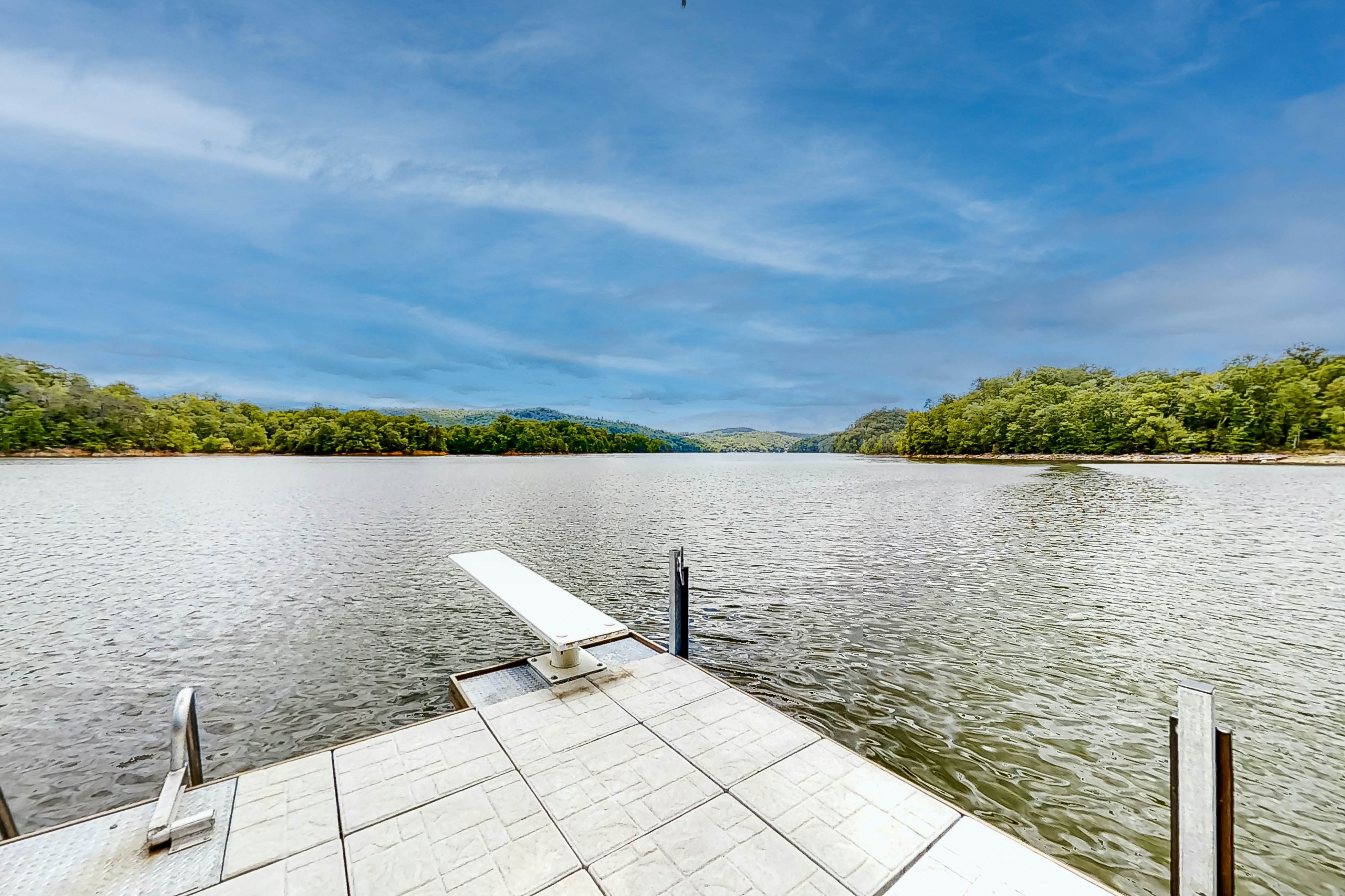 Lakefront home with amazing views, grill, fire pit, private dock, & AC