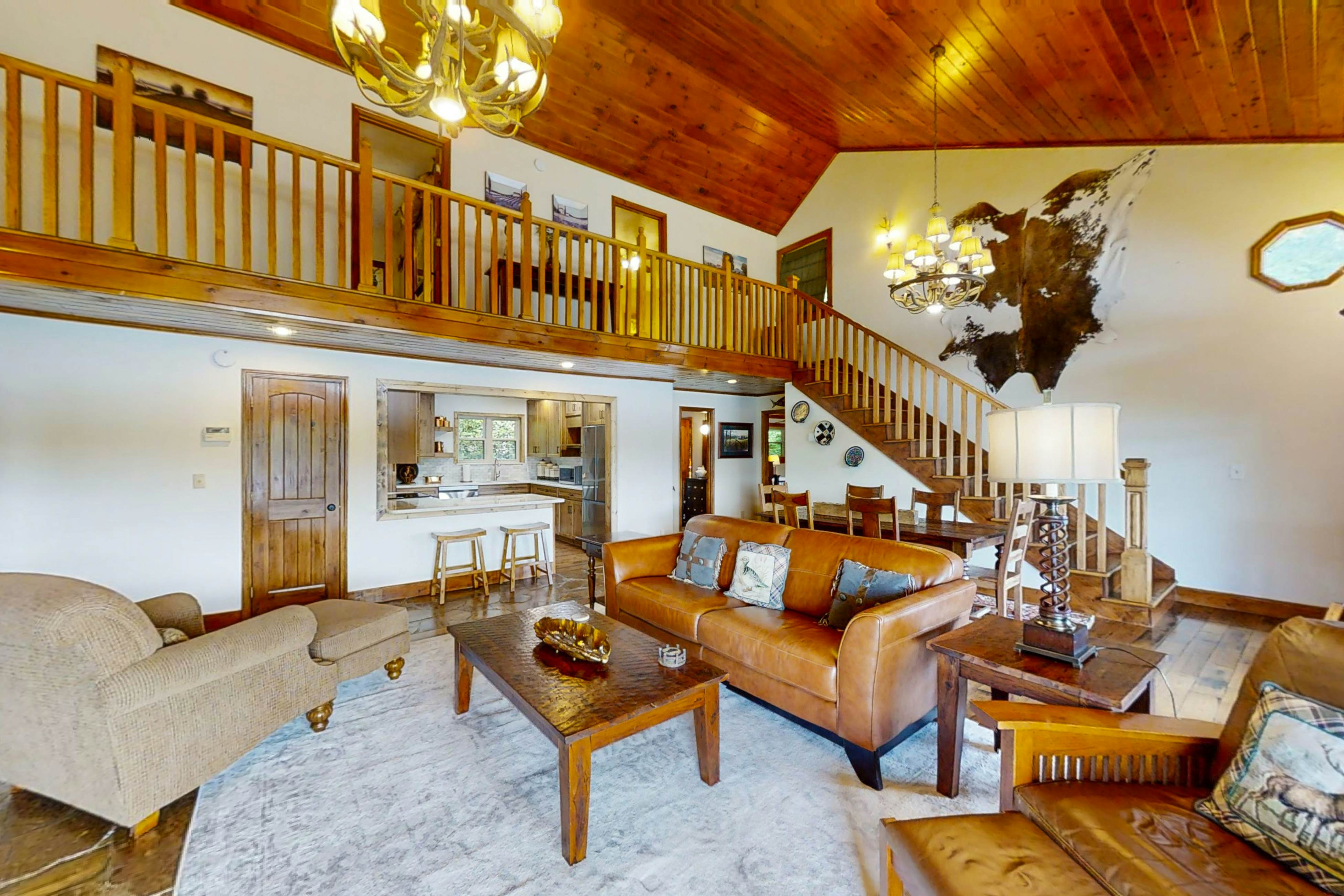 Lakefront home with amazing views, grill, fire pit, private dock, & AC