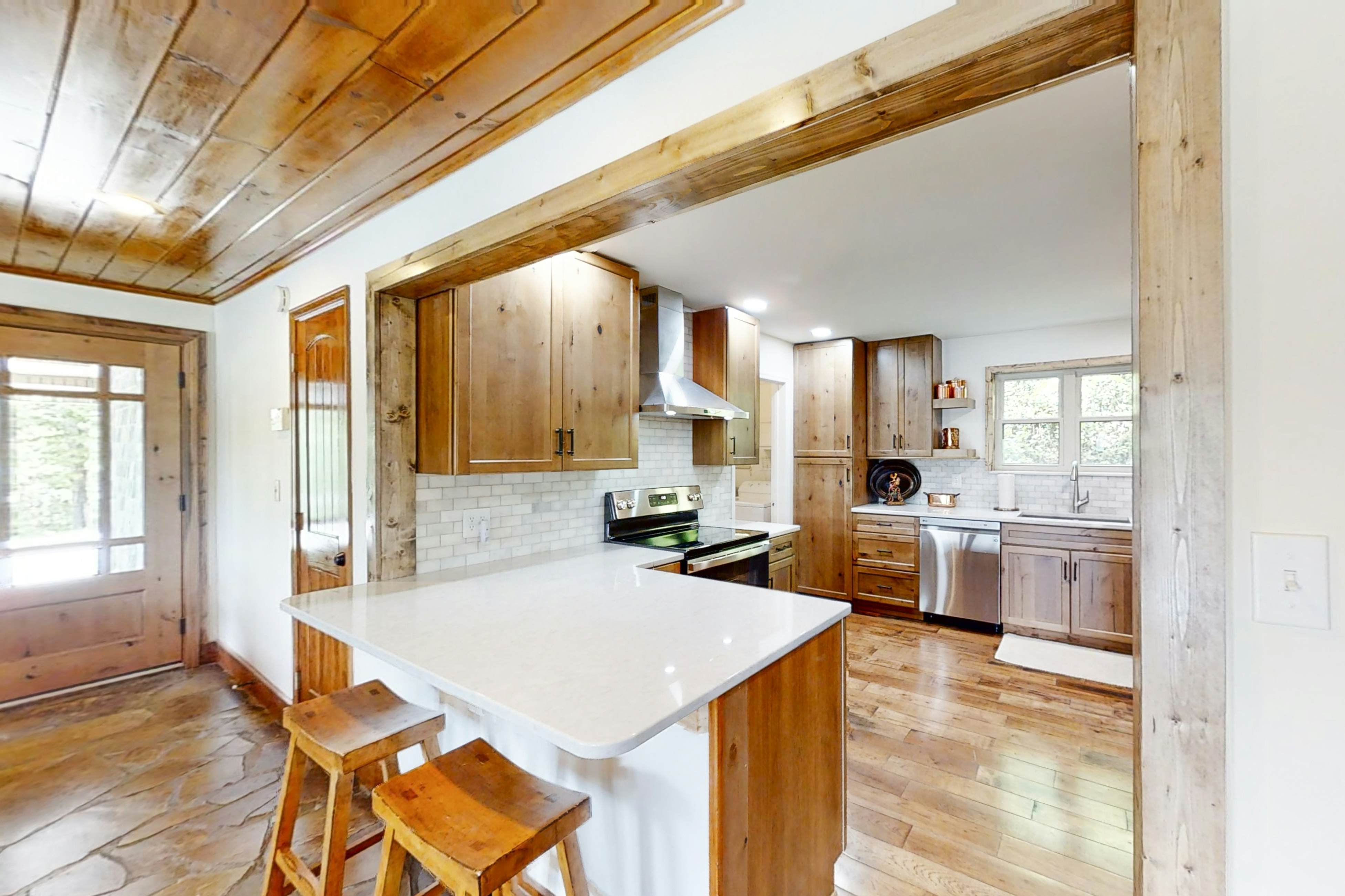 Lakefront home with amazing views, grill, fire pit, private dock, & AC