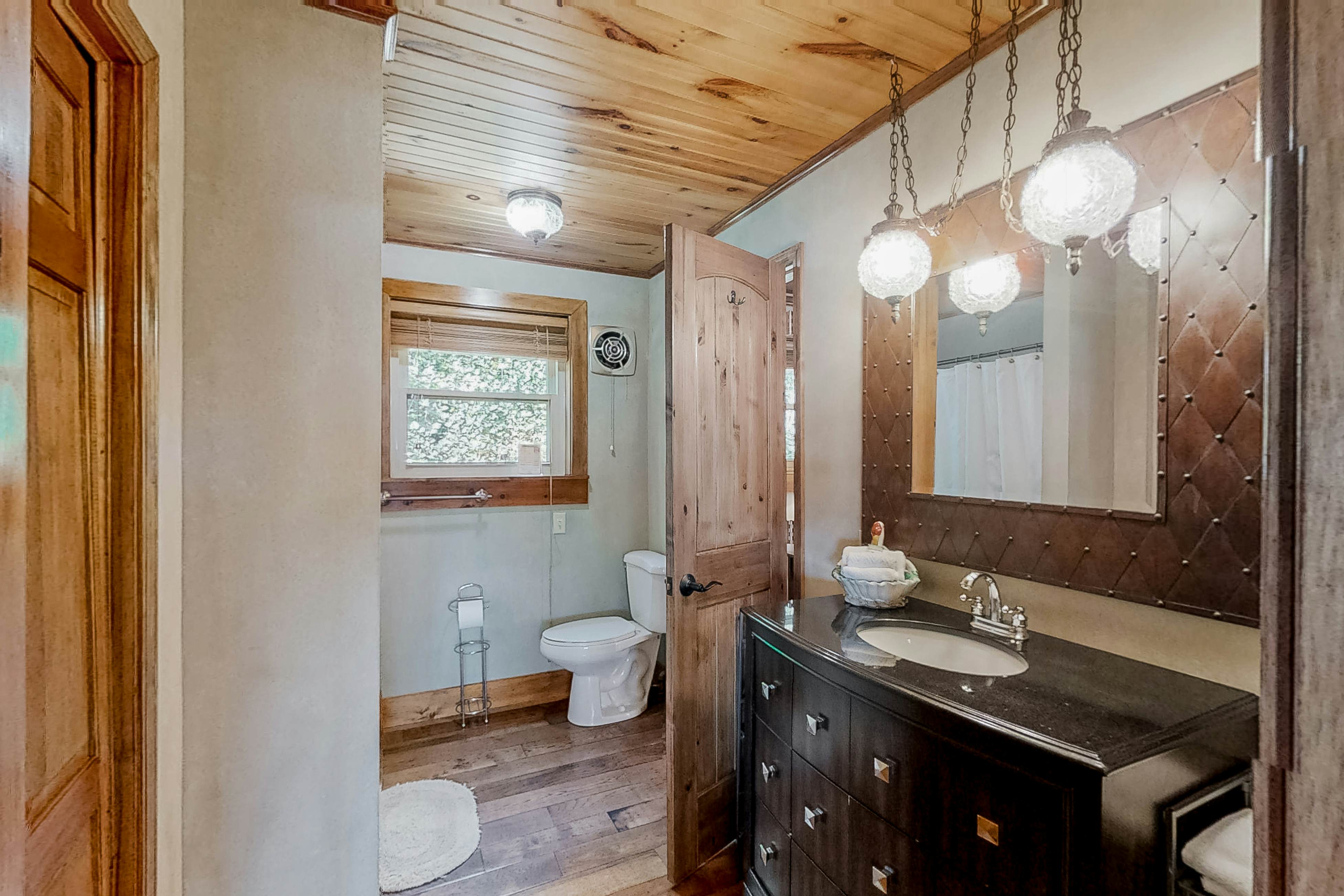 Lakefront home with amazing views, grill, fire pit, private dock, & AC