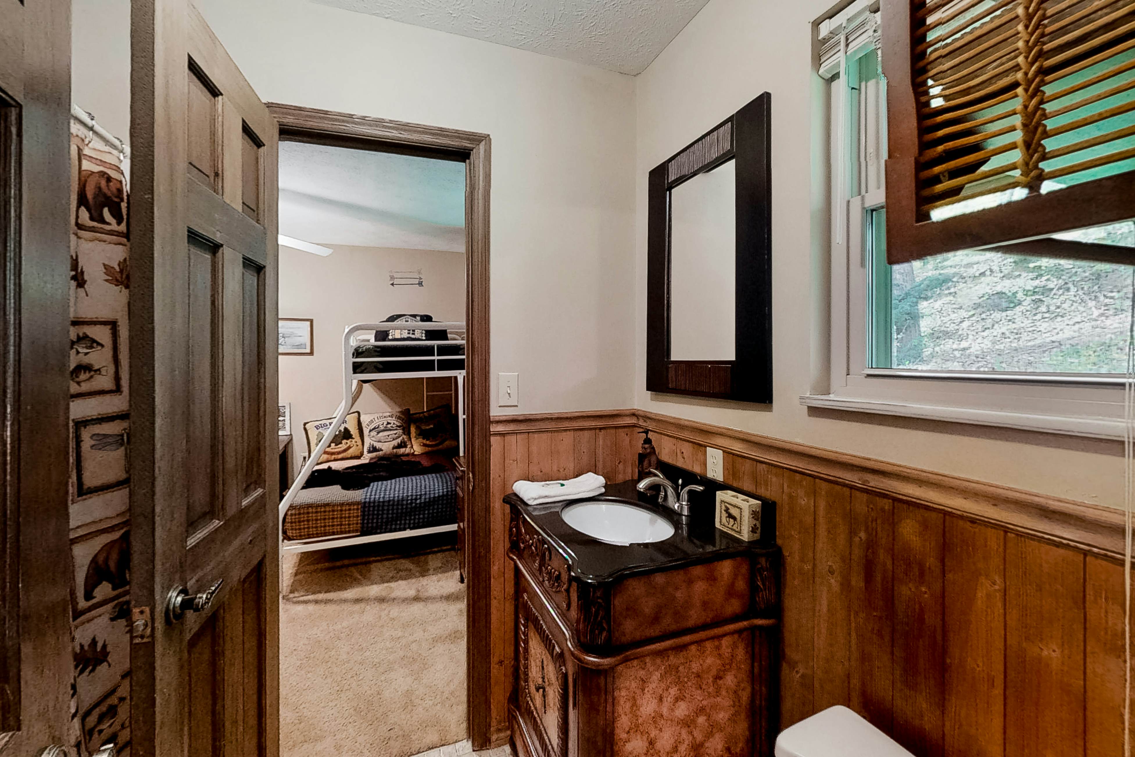 Lakefront home with amazing views, grill, fire pit, private dock, & AC