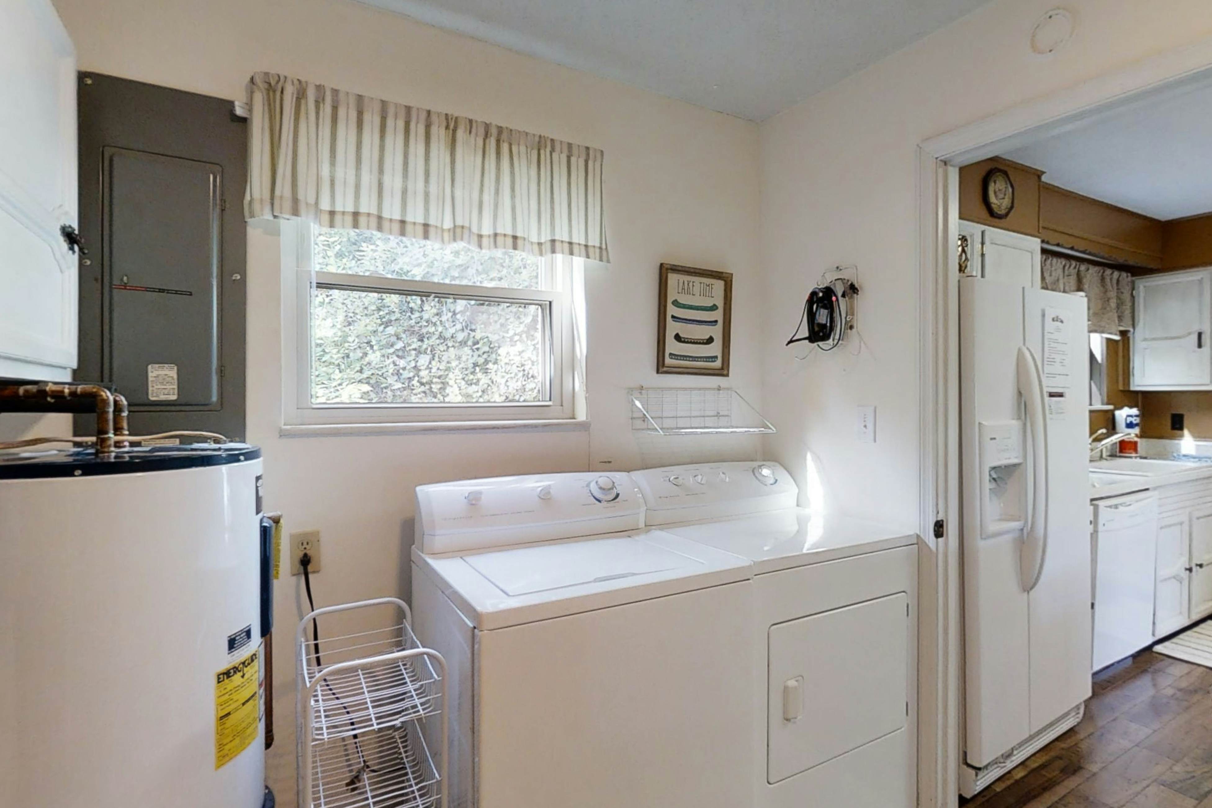 Lakefront home with amazing views, grill, fire pit, private dock, & AC