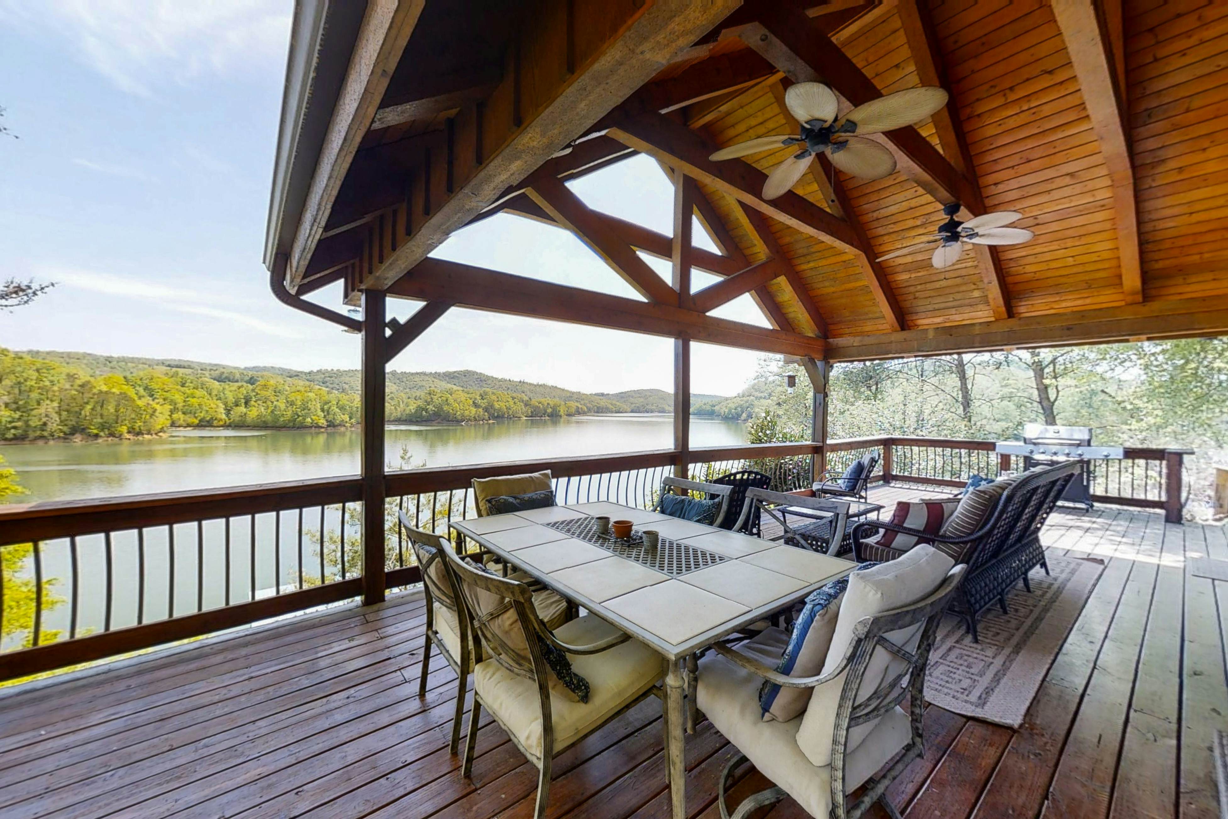 Lakefront home with amazing views, grill, fire pit, private dock, & AC