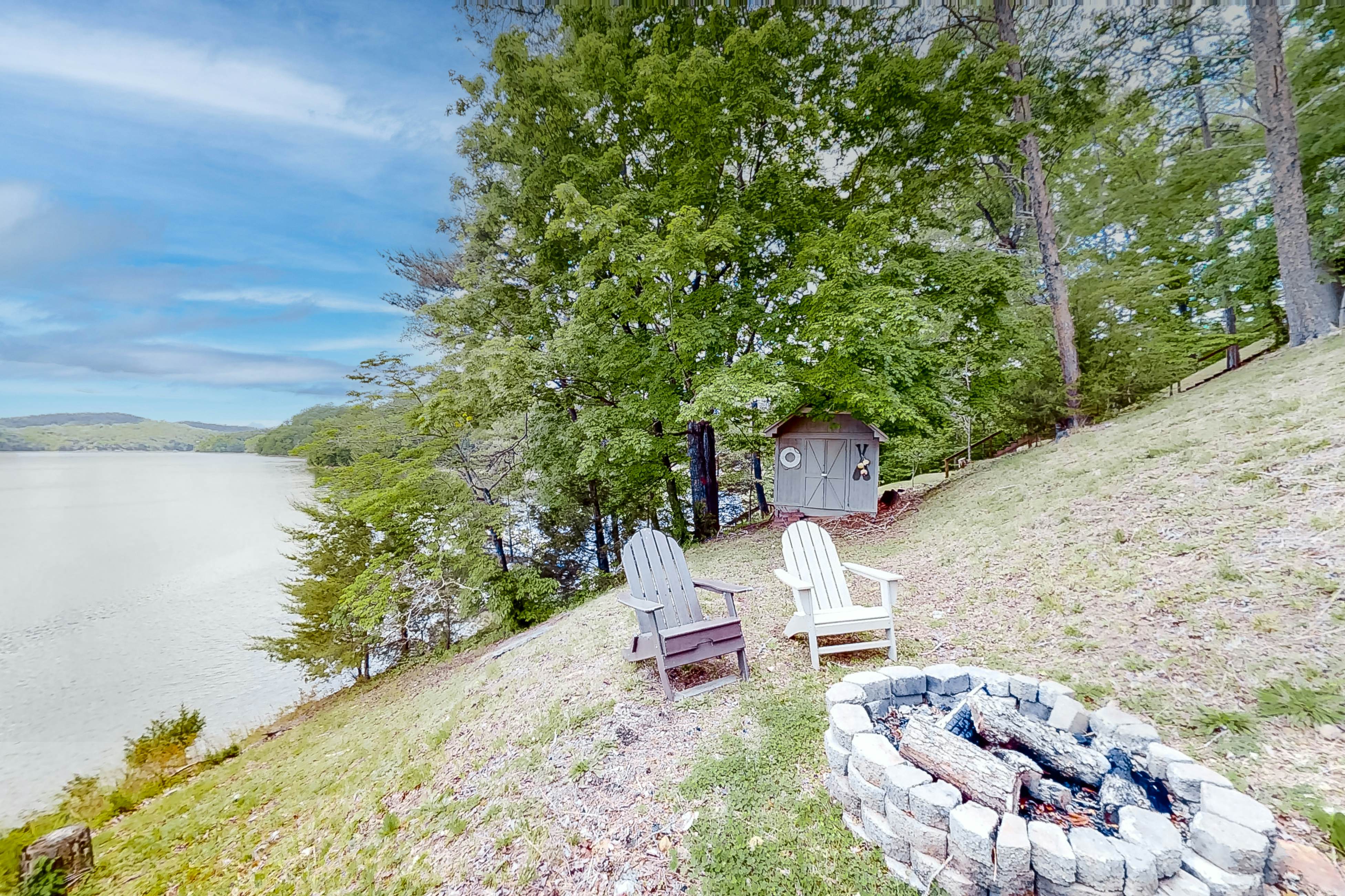 Lakefront home with amazing views, grill, fire pit, private dock, & AC