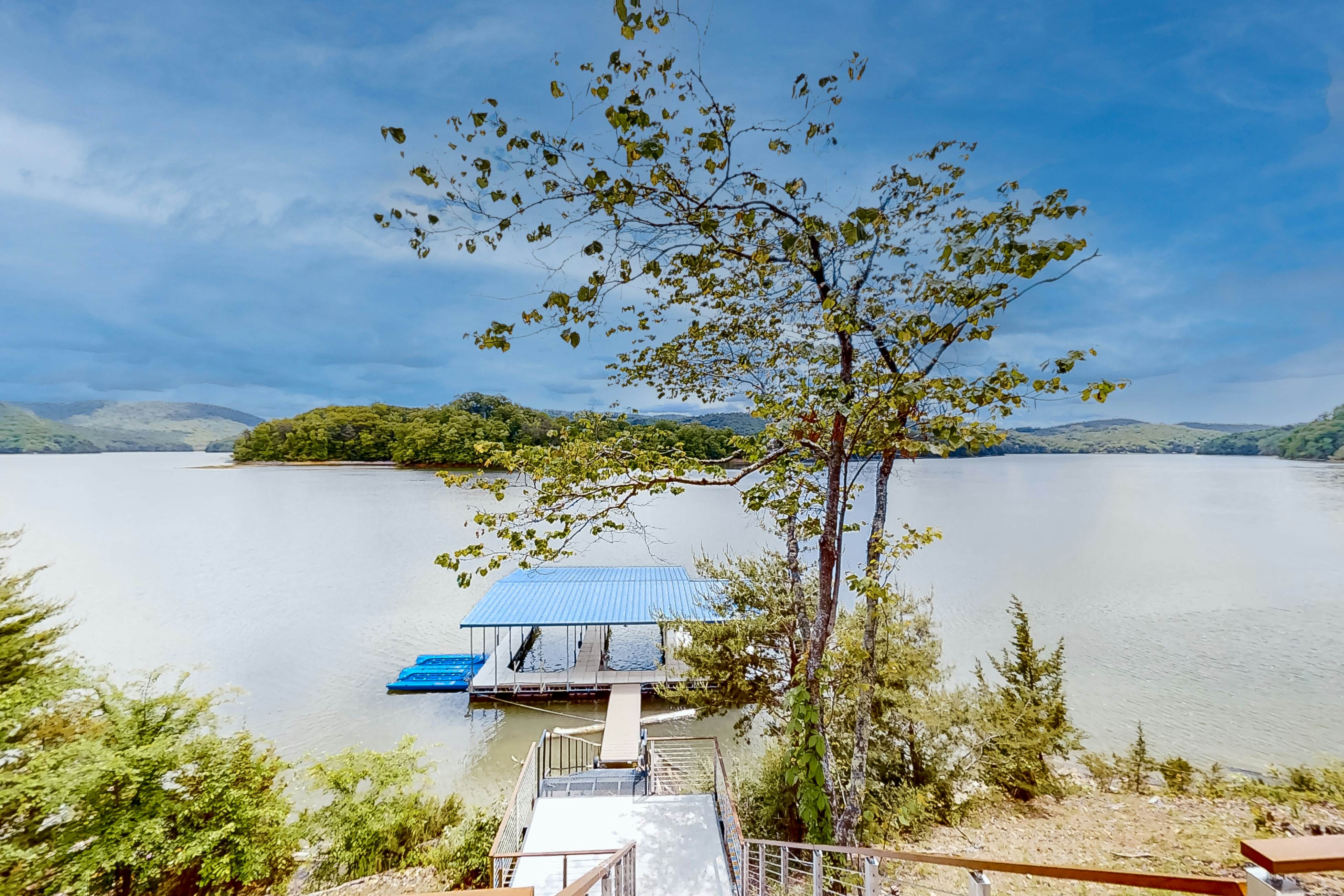 Lakefront home with amazing views, grill, fire pit, private dock, & AC