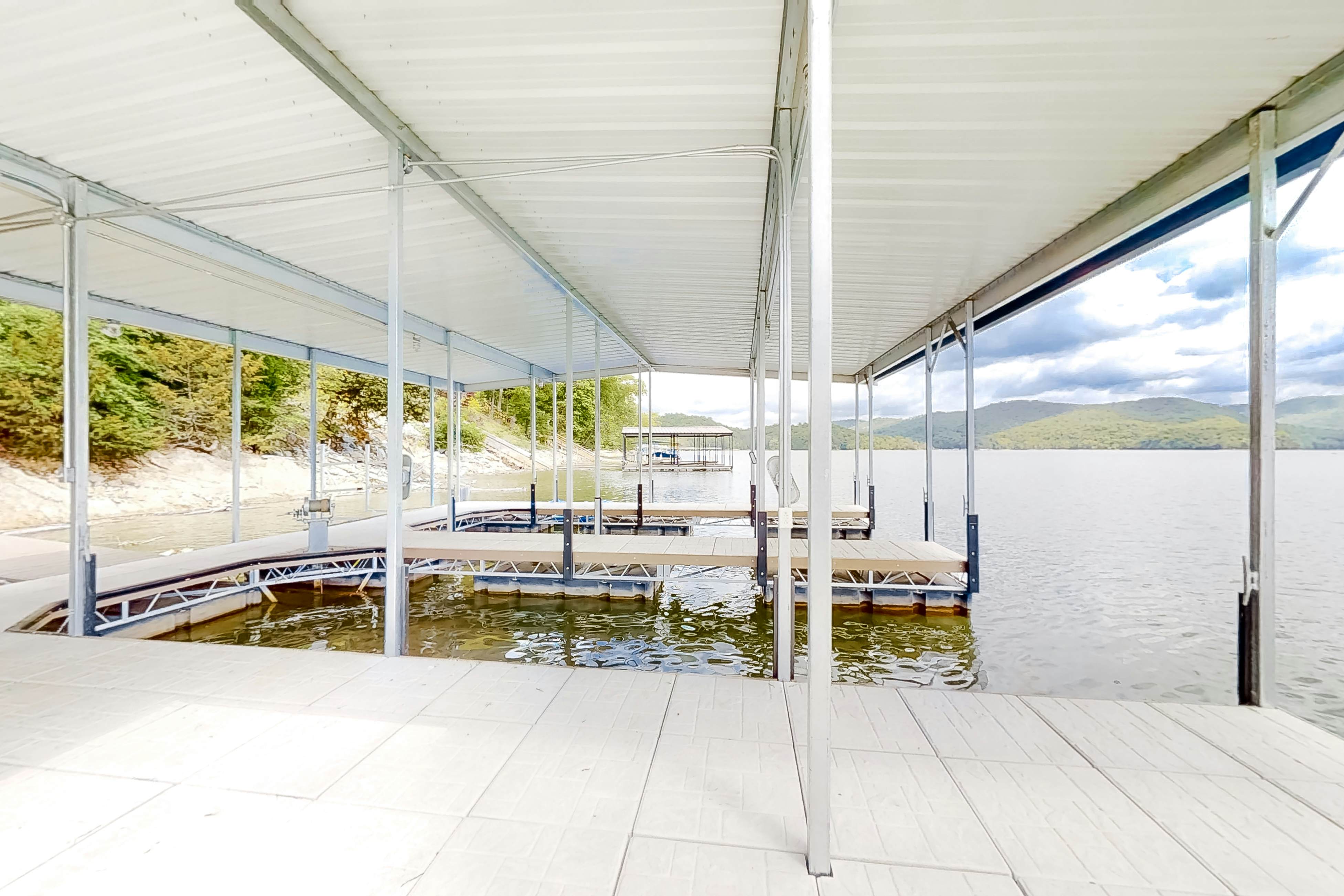 Lakefront home with amazing views, grill, fire pit, private dock, & AC