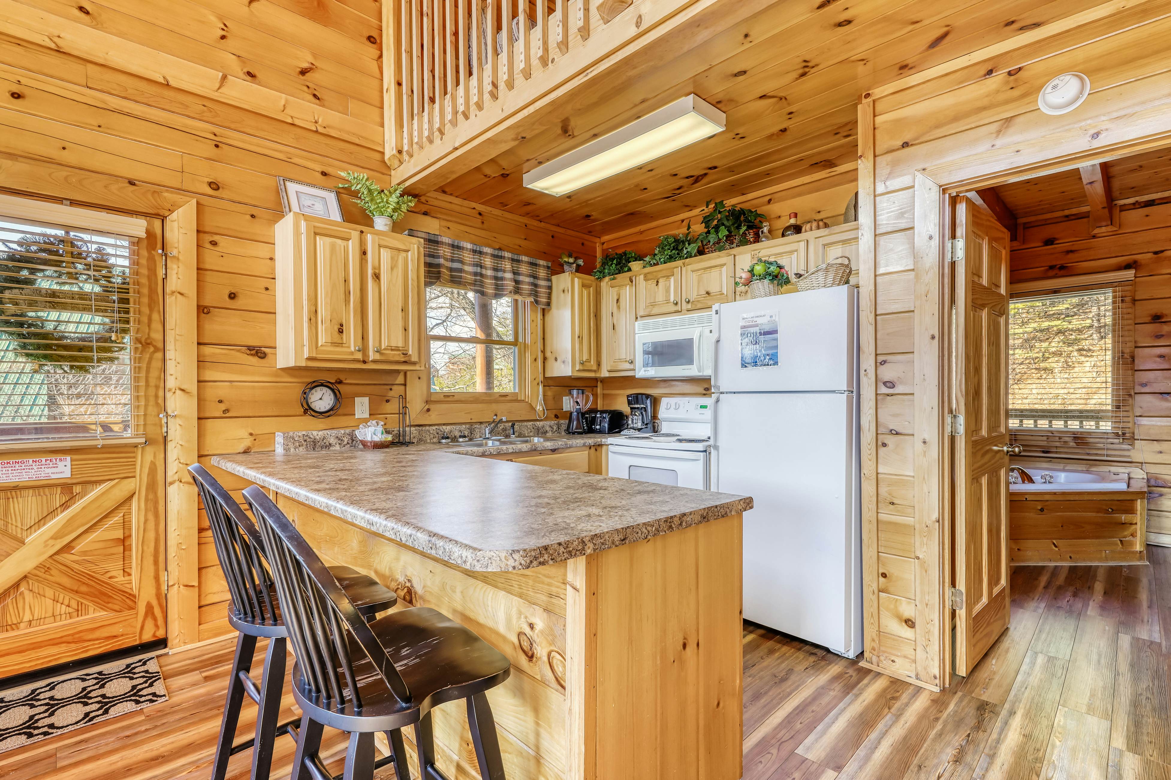 Lovely cabin w/ Free Attraction Tickets, a private hot tub, & mountain views