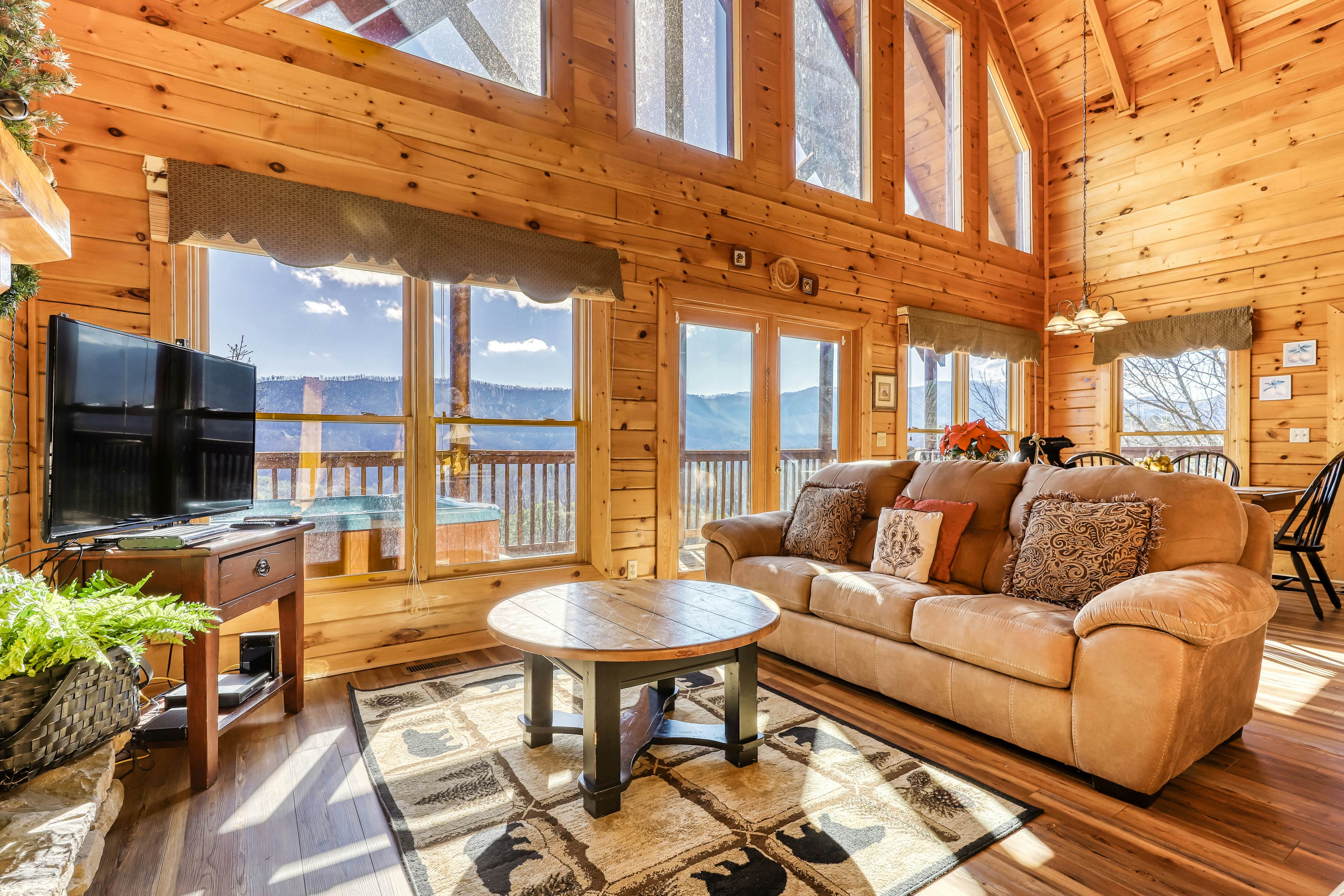 Lovely cabin w/ Free Attraction Tickets, a private hot tub, & mountain views