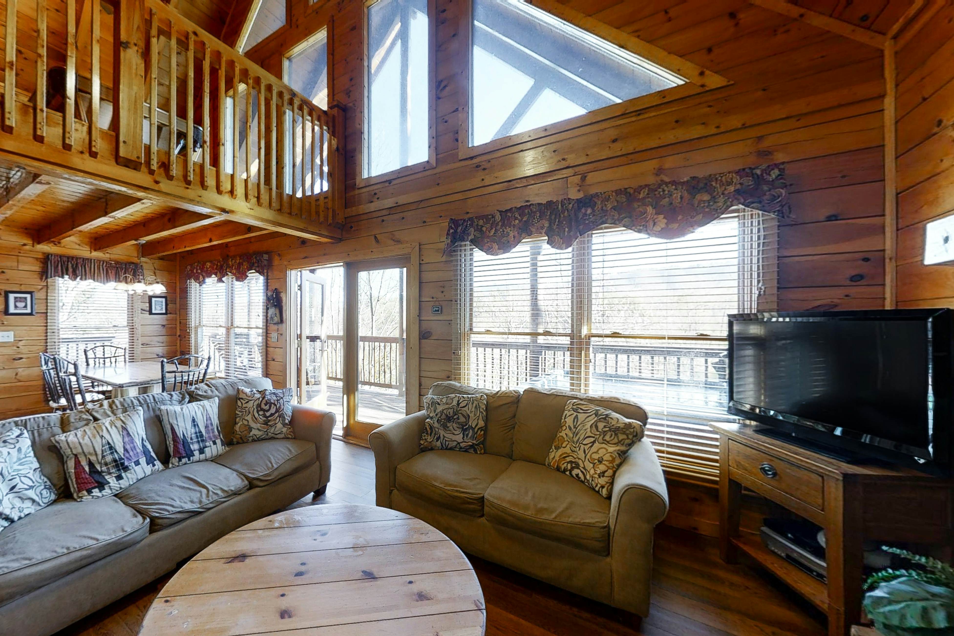 Elegant Two-Story Cabin w/ Free Attraction Tickets, Hot Tub, & Pool Table