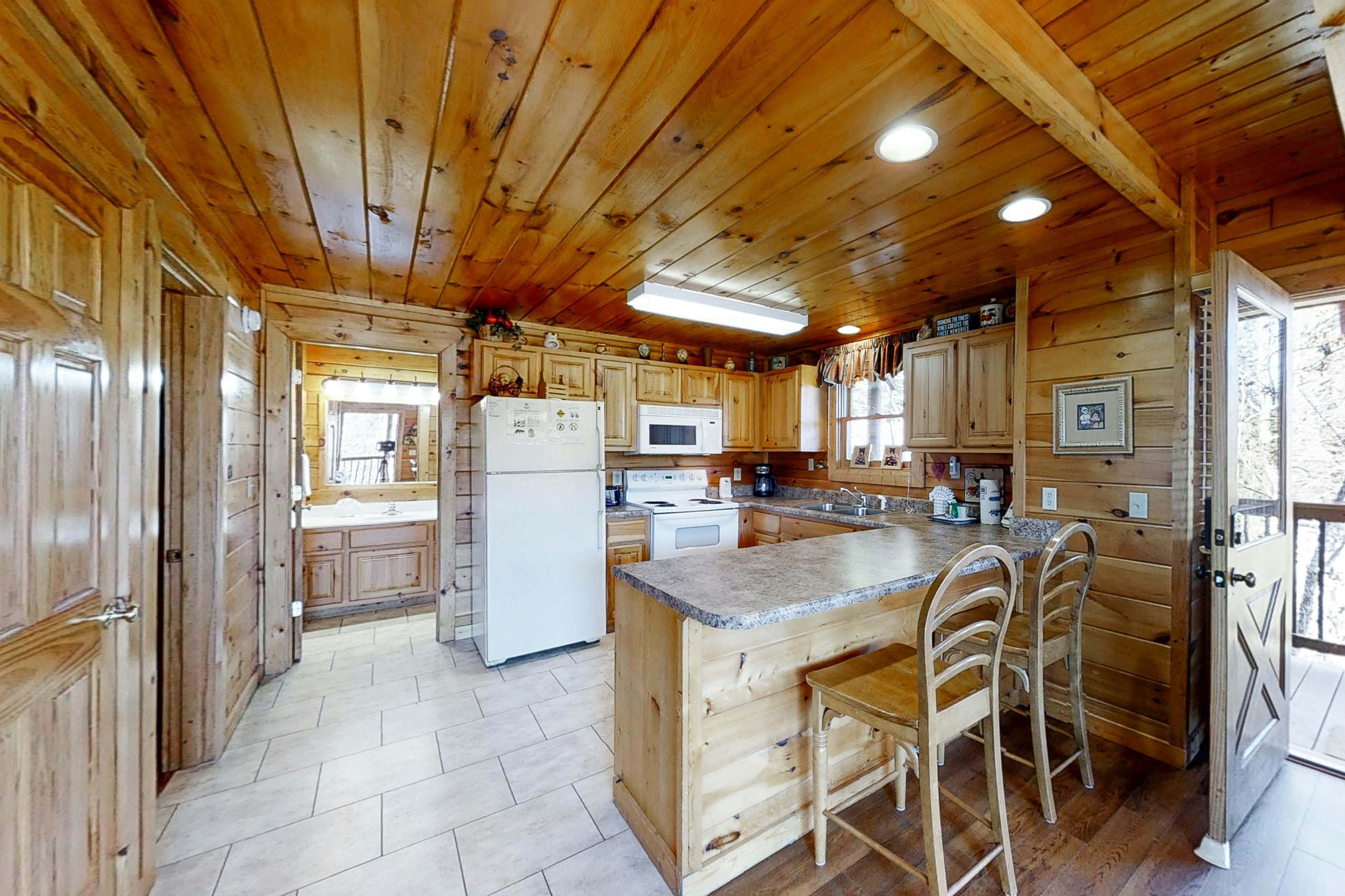 Elegant Two-Story Cabin w/ Free Attraction Tickets, Hot Tub, & Pool Table