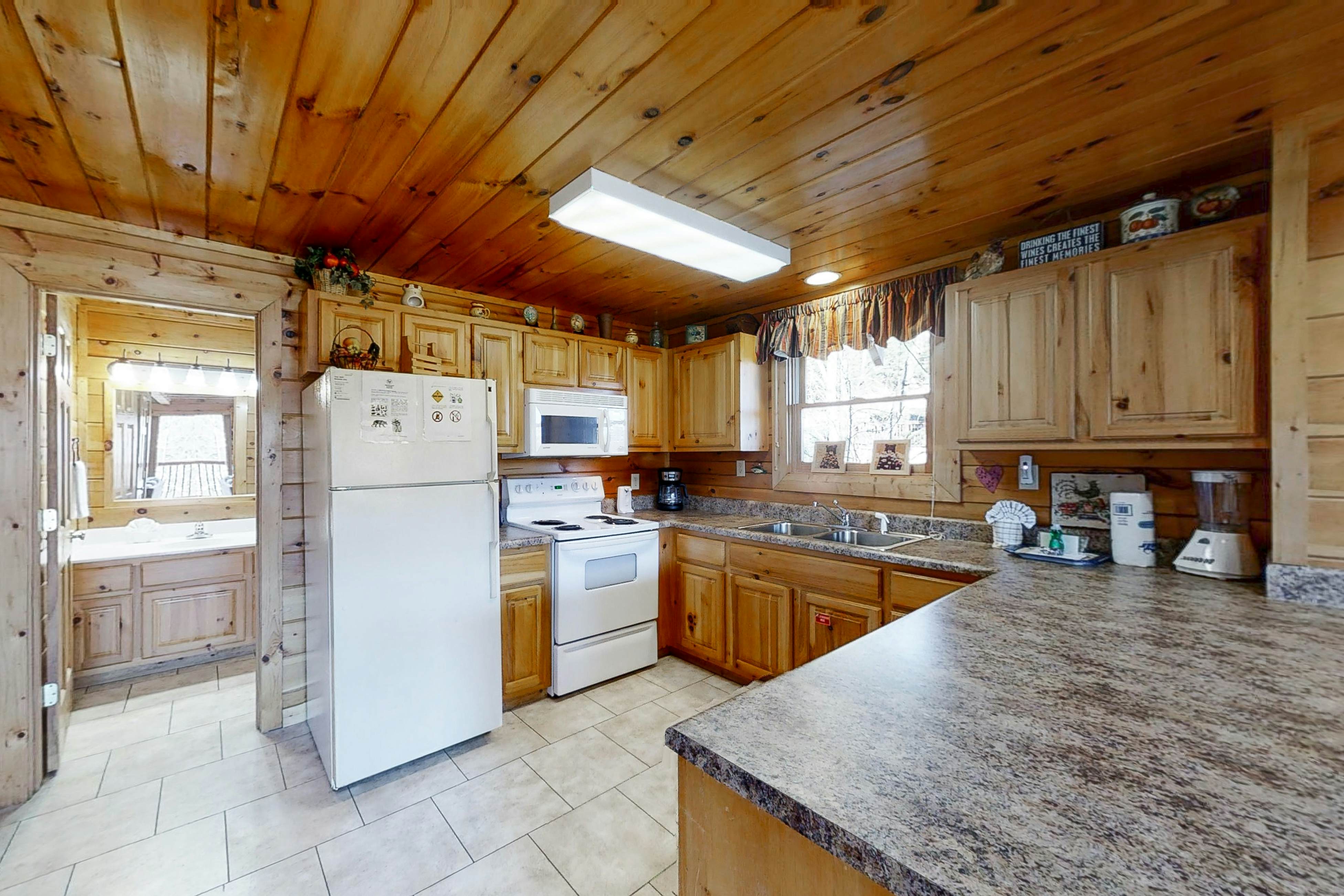 Elegant Two-Story Cabin w/ Free Attraction Tickets, Hot Tub, & Pool Table