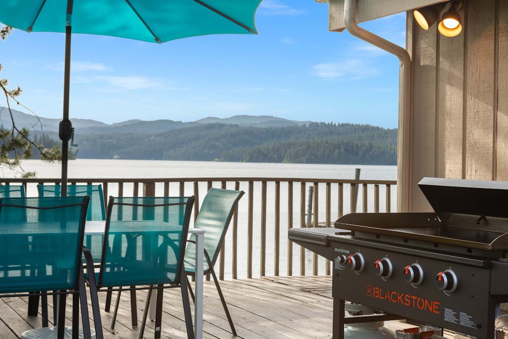 Wake up steps away from the water, roll out of bed straight onto your private deck, and watch the morning sun ignite Lake Coeur d'Alene. This is the cabin that delivers on the dream—a private dock for kayaking at sunrise, peaceful seclusion on the western shore, and the kind of setting where days slow down and time disappears.