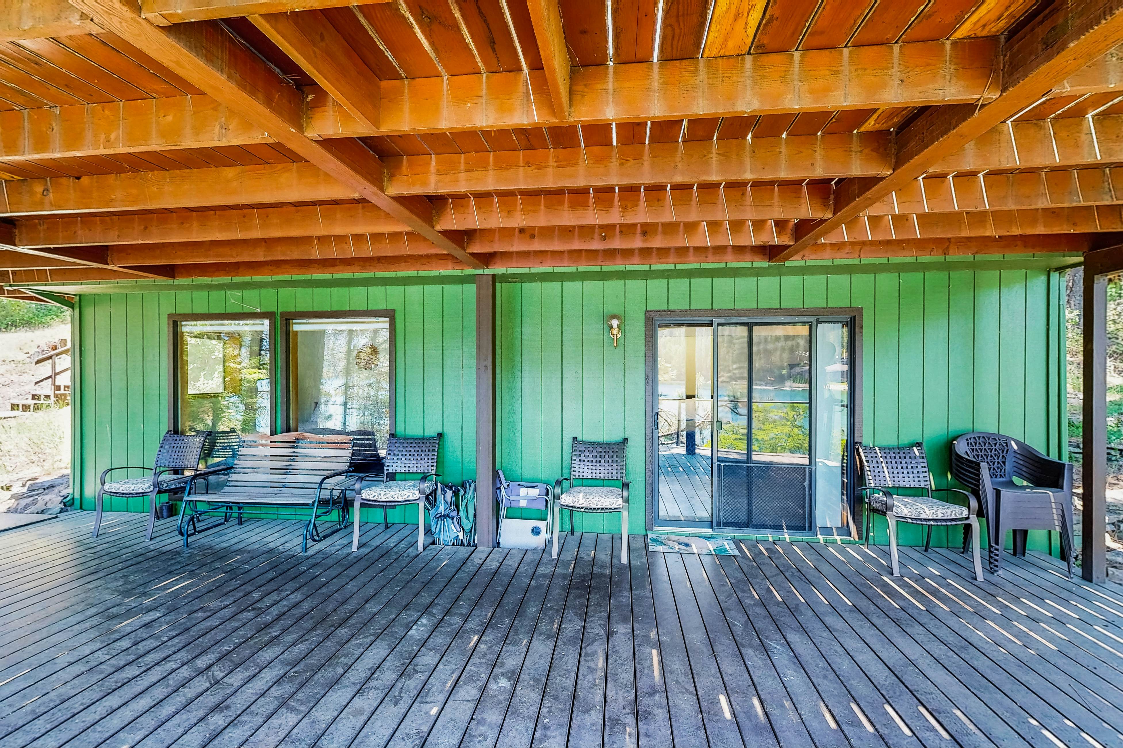 Secluded akefront home with private dock, two-level deck, & BBQ area