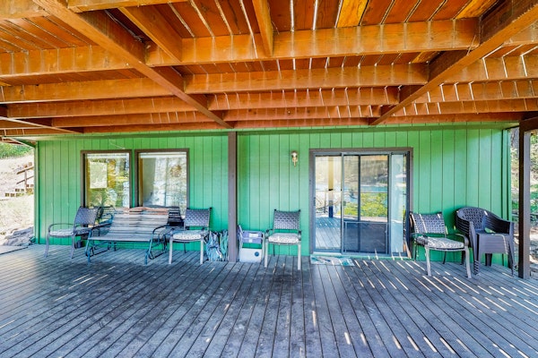 Secluded akefront home with private dock, two-level deck, & BBQ area