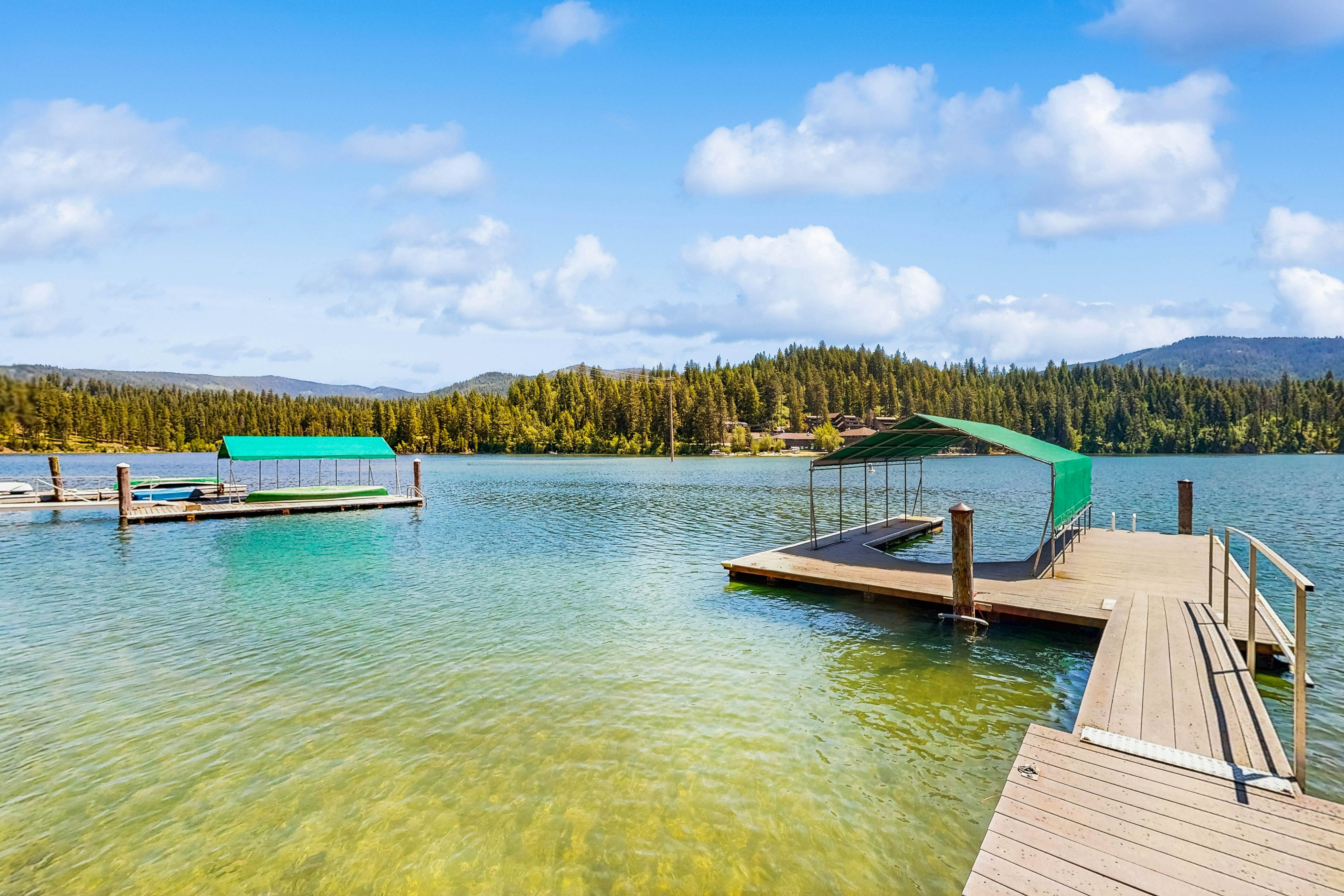 Secluded akefront home with private dock, two-level deck, & BBQ area