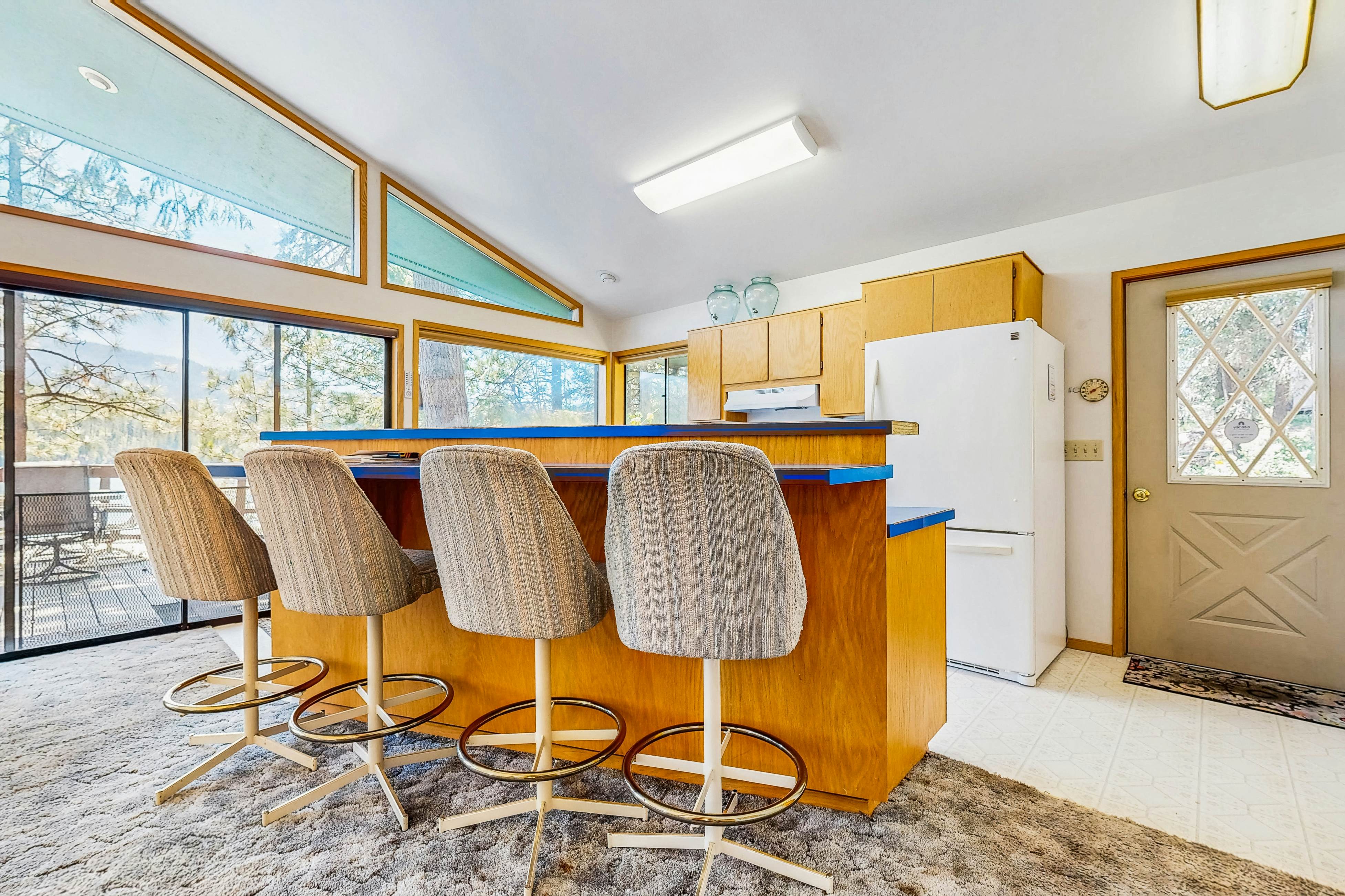 Secluded akefront home with private dock, two-level deck, & BBQ area