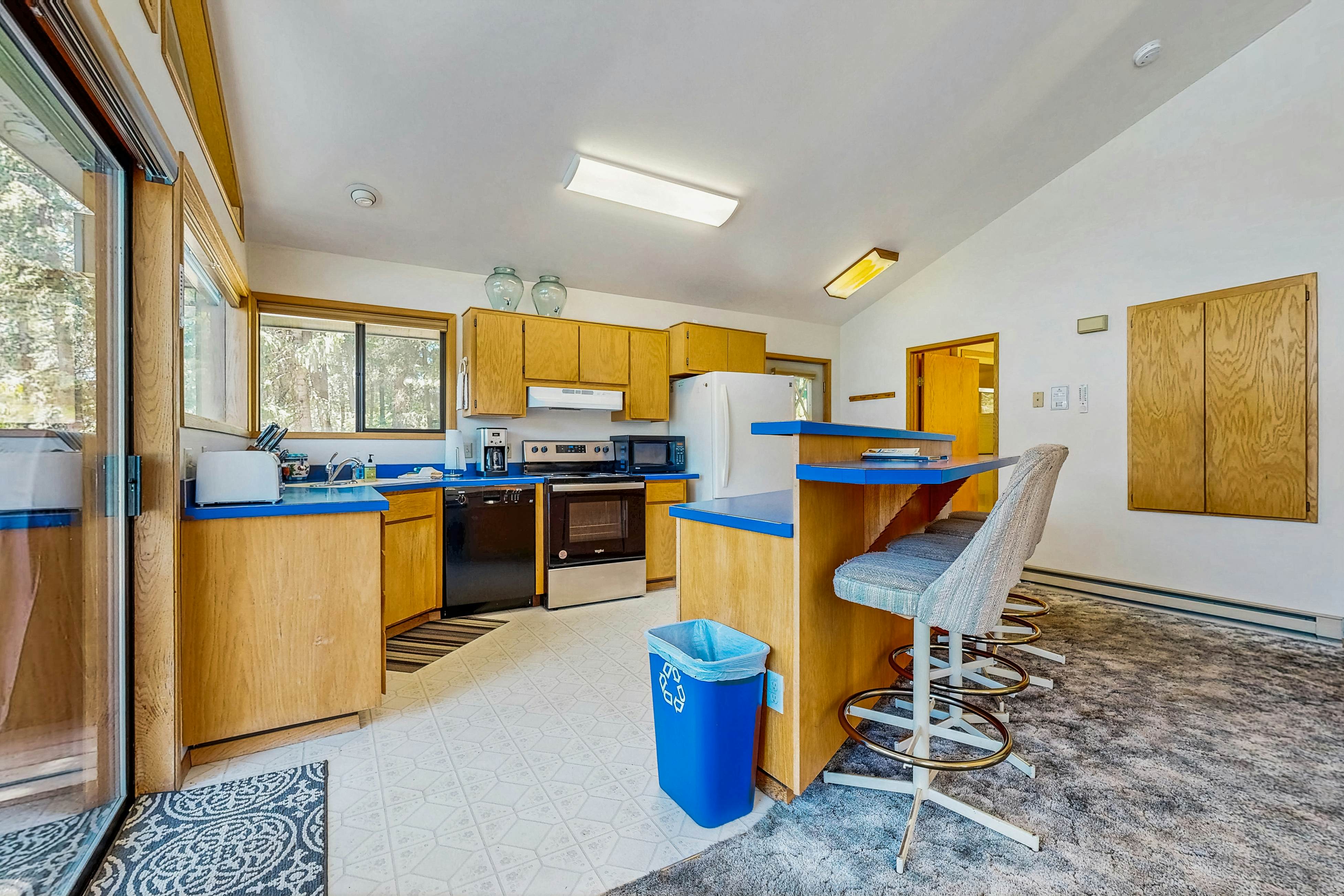 Secluded akefront home with private dock, two-level deck, & BBQ area