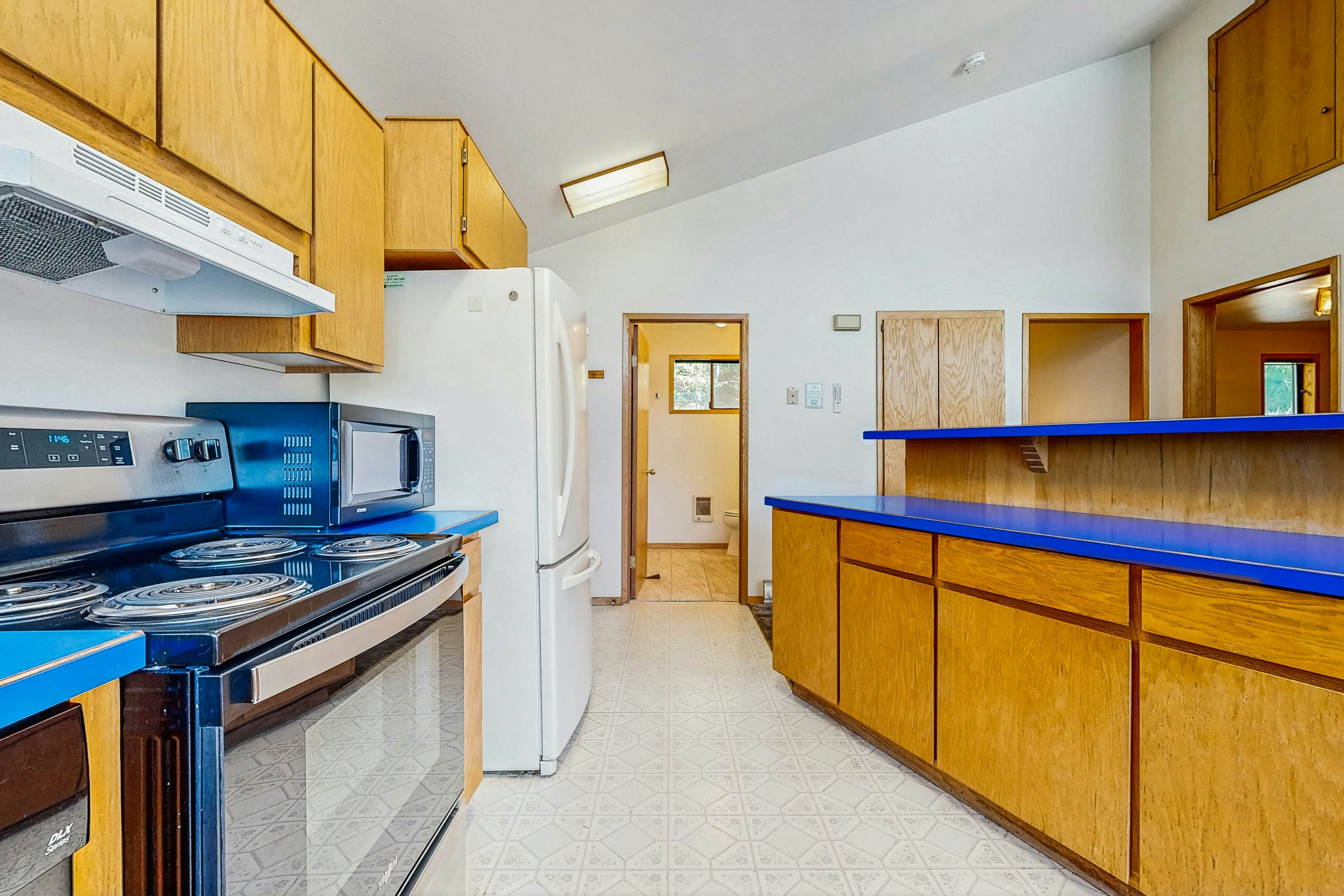 Secluded akefront home with private dock, two-level deck, & BBQ area