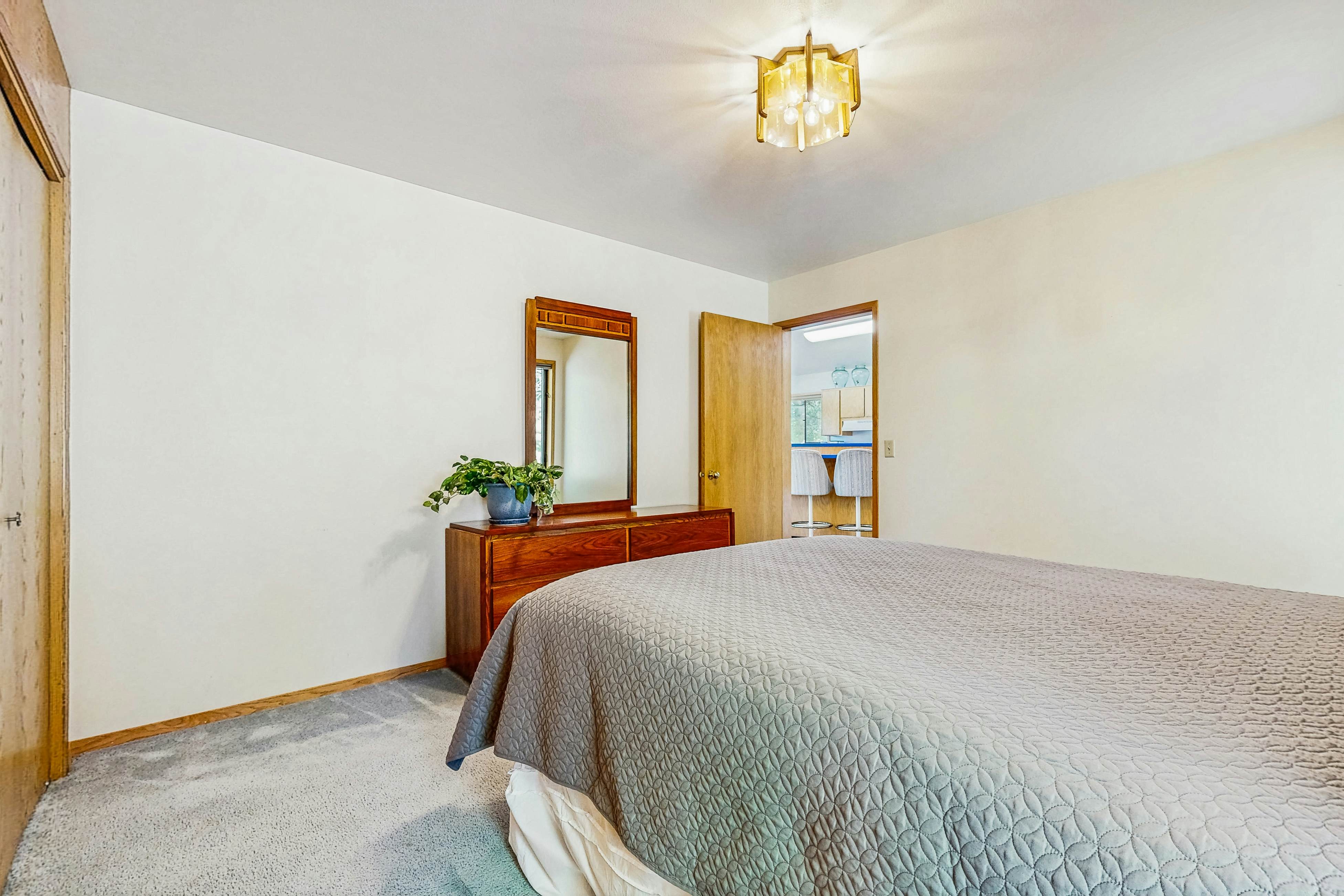 Secluded akefront home with private dock, two-level deck, & BBQ area