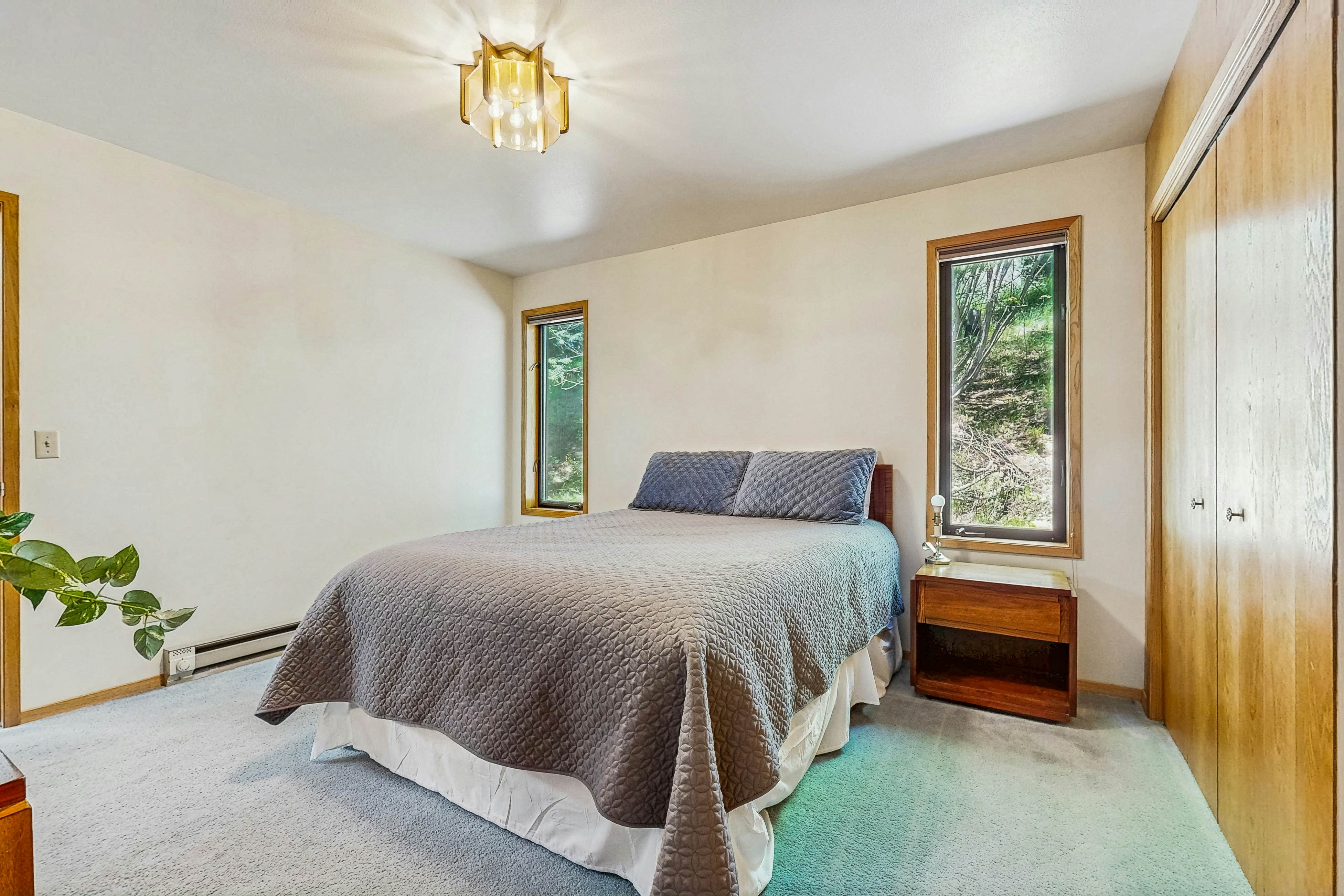 Secluded akefront home with private dock, two-level deck, & BBQ area