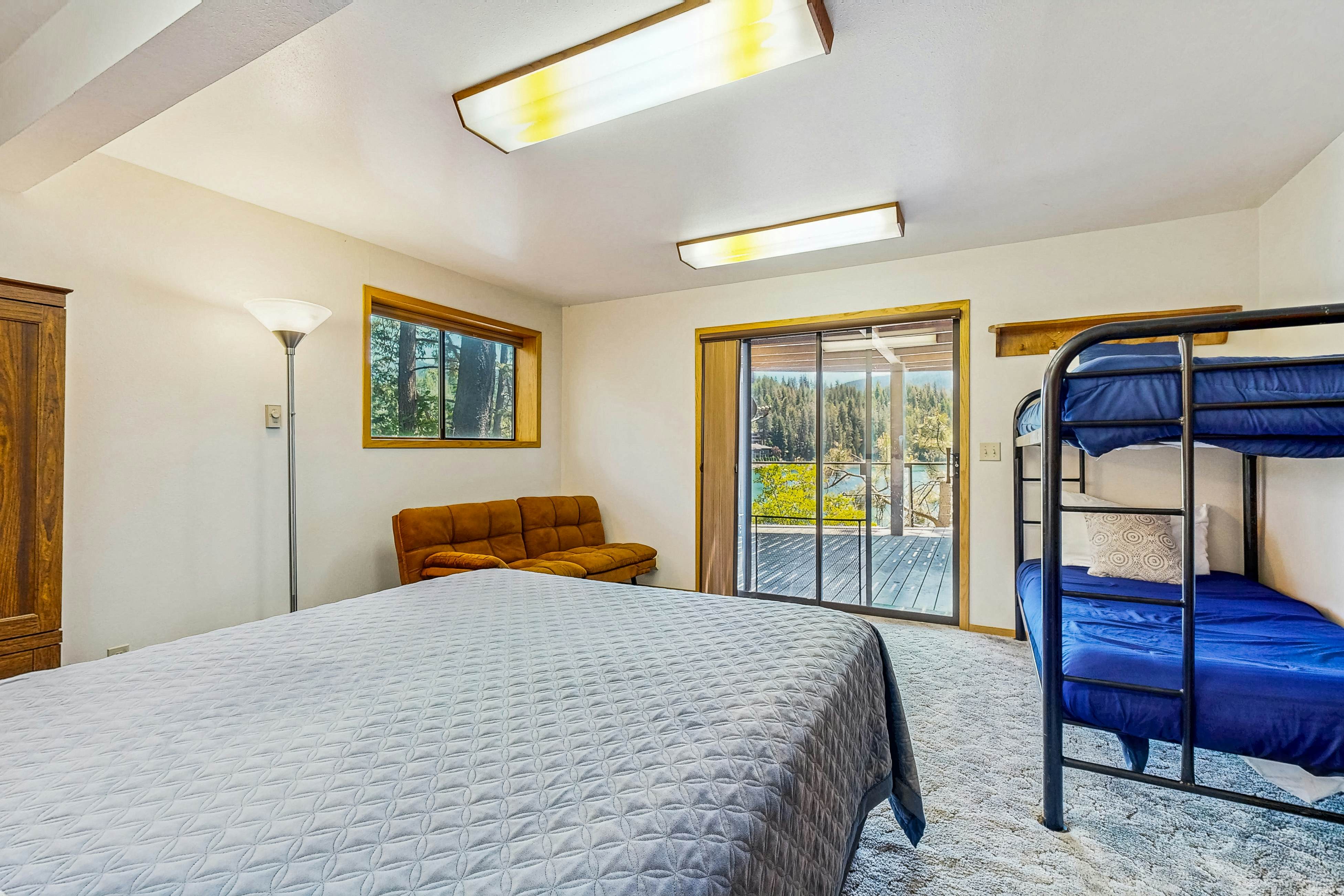 Secluded akefront home with private dock, two-level deck, & BBQ area