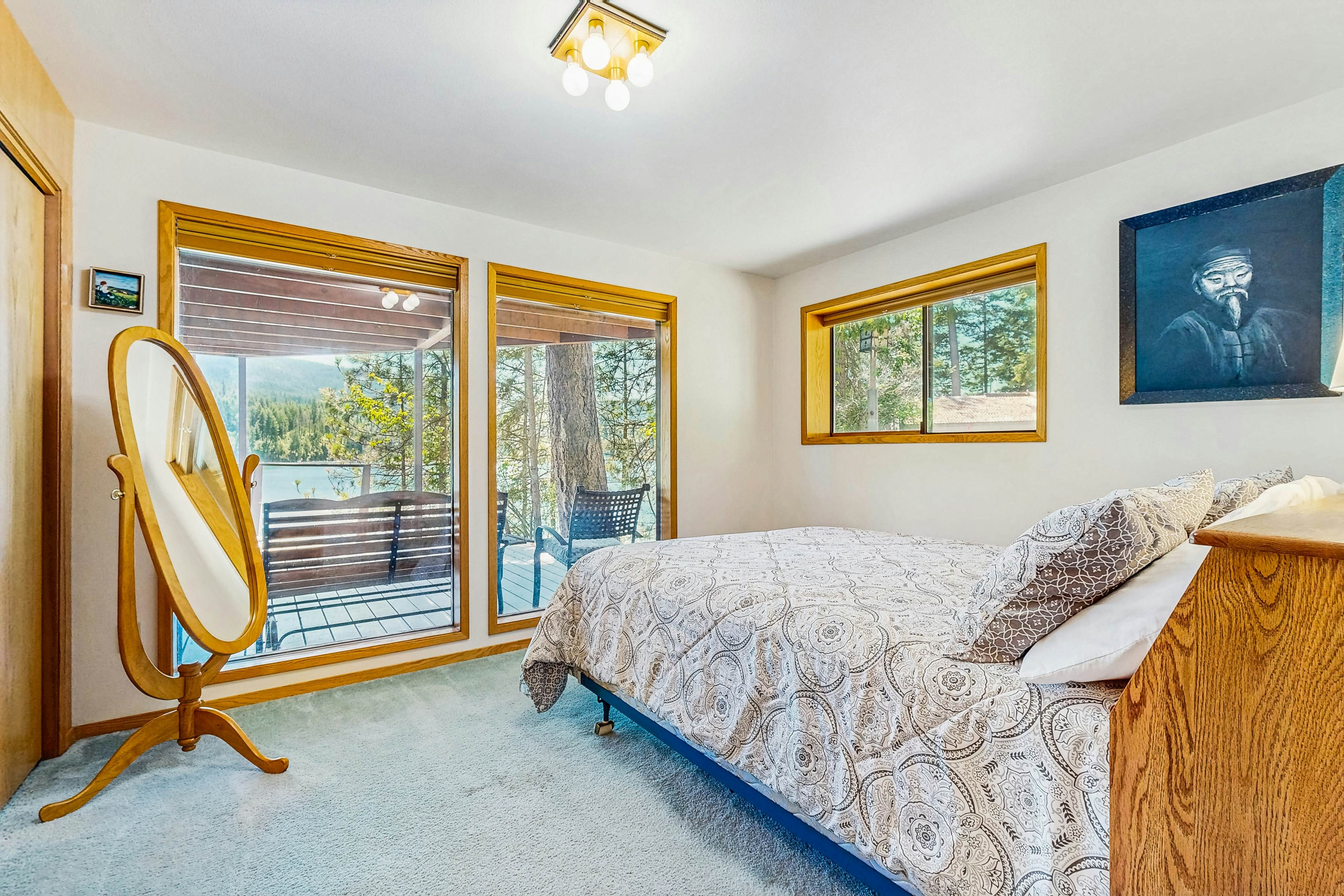 Secluded akefront home with private dock, two-level deck, & BBQ area