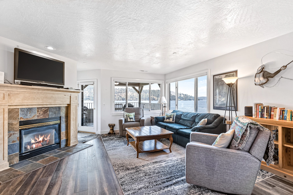 Lakefront Condo with Balcony & Mountain Views