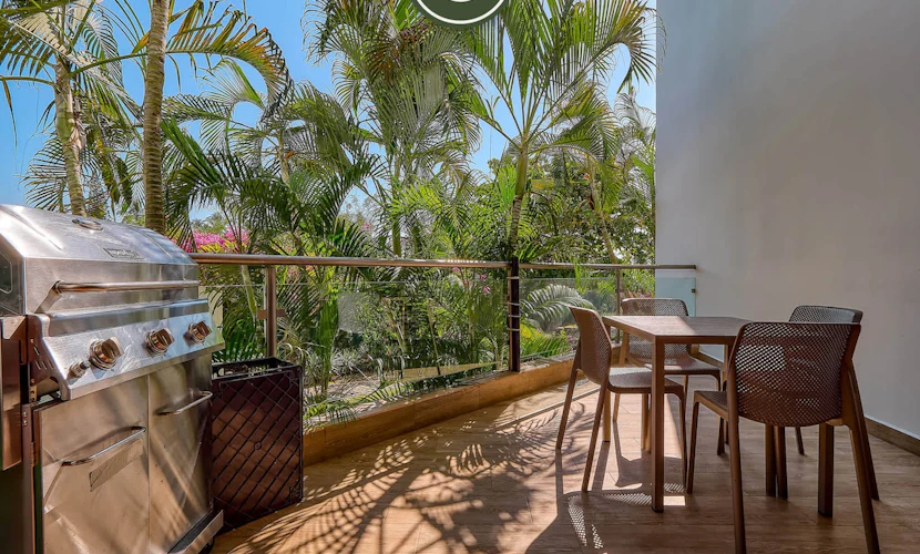 Modern 2BR Beachfront Retreat in Flamingos: 1.5BA, BBQ & Private Balcony
