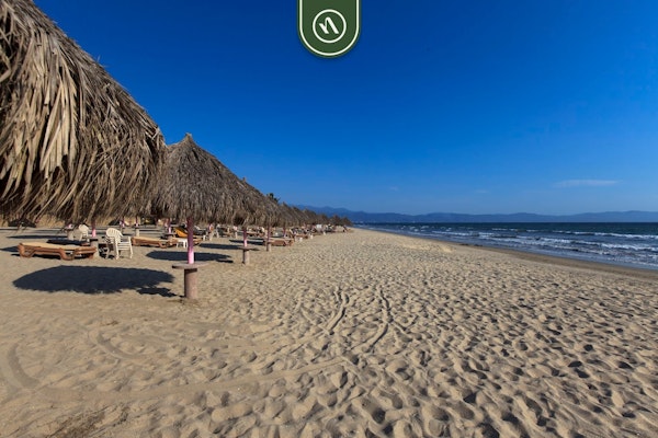 Mexican Styled 2 BR Condo - Beachfront - Pool