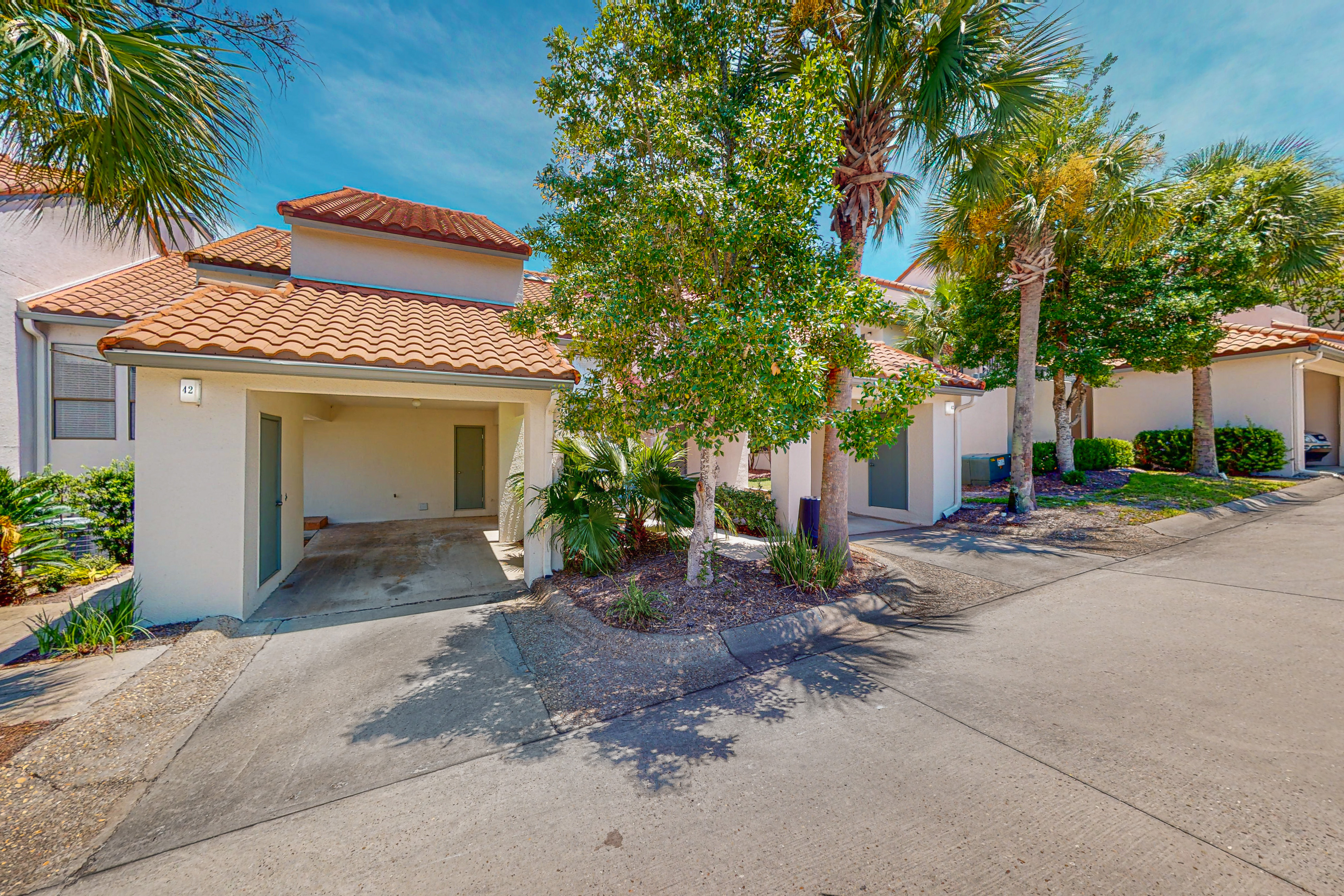 Court-Side Condo with Balcony Pool and Hot Tub