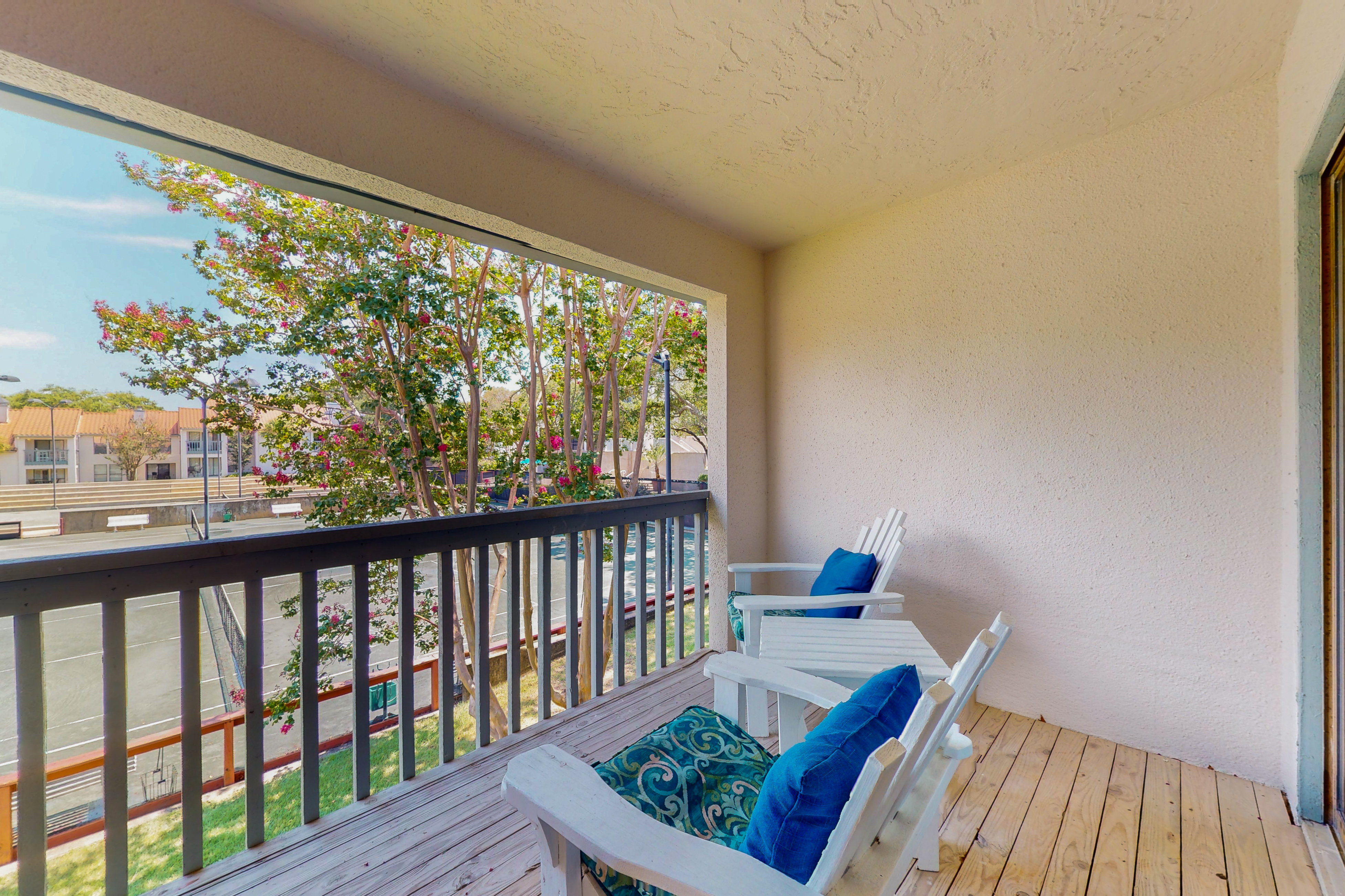 Court-Side Condo with Balcony Pool and Hot Tub