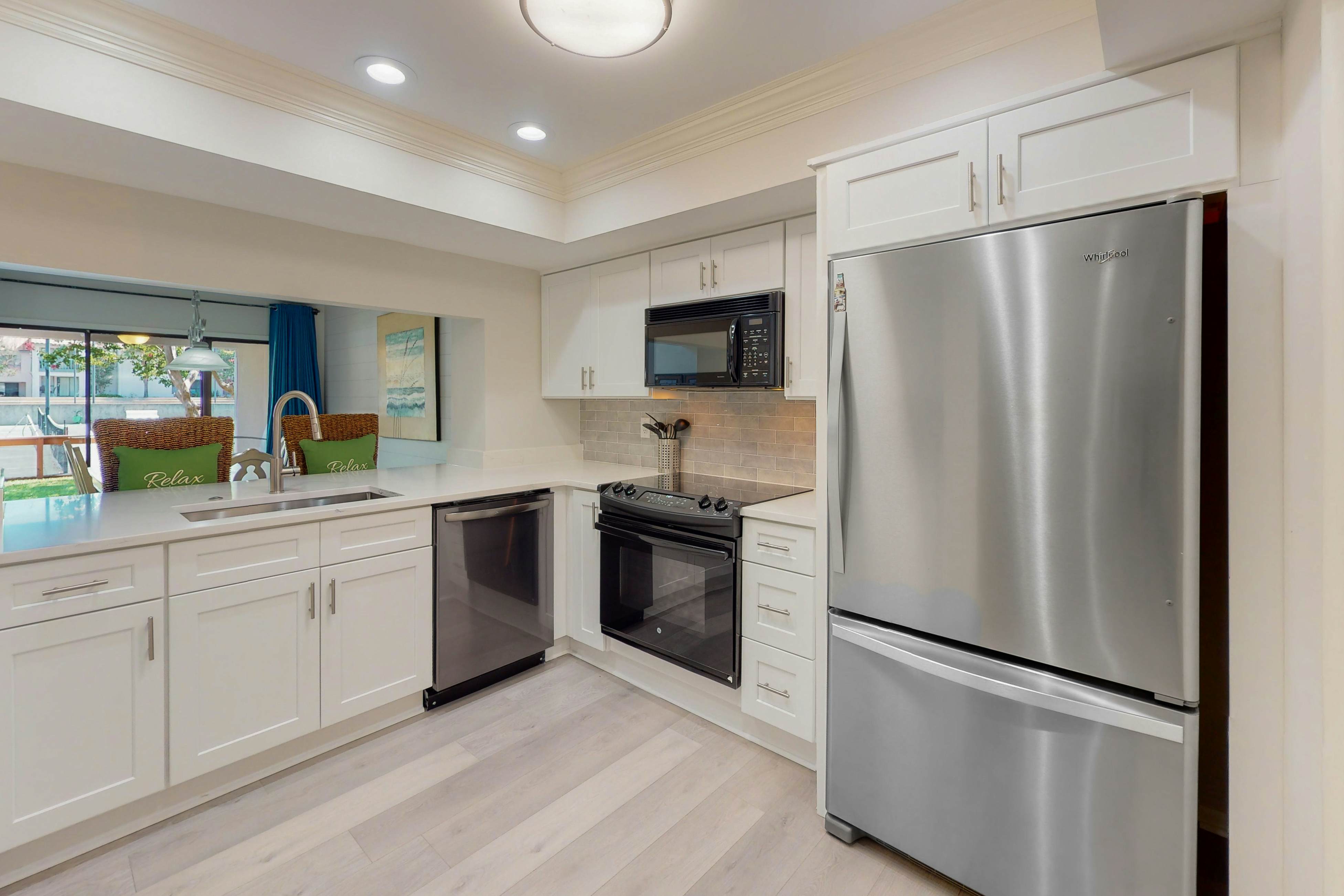 Court-Side Condo with Balcony Pool and Hot Tub