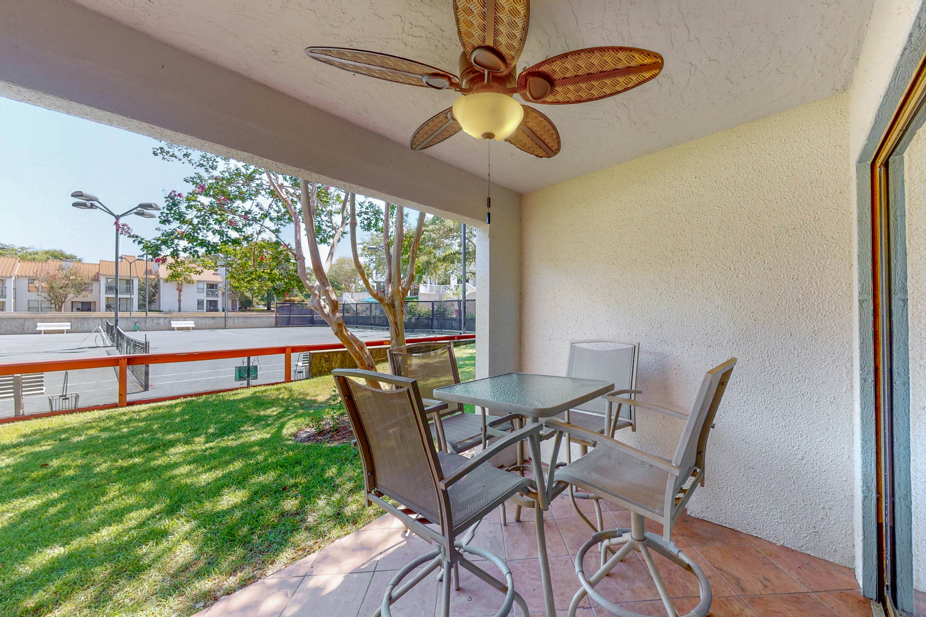 Court-Side Condo with Balcony Pool and Hot Tub