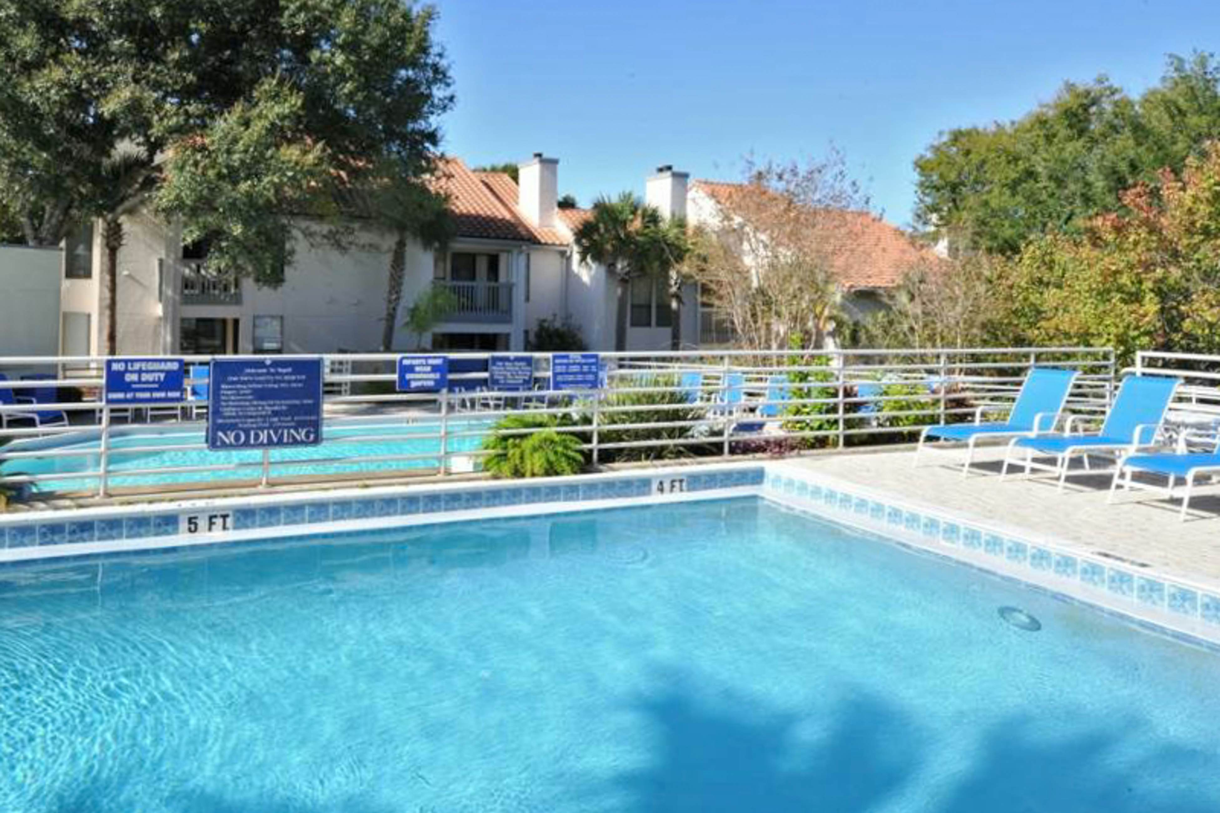 Court-Side Condo with Balcony Pool and Hot Tub