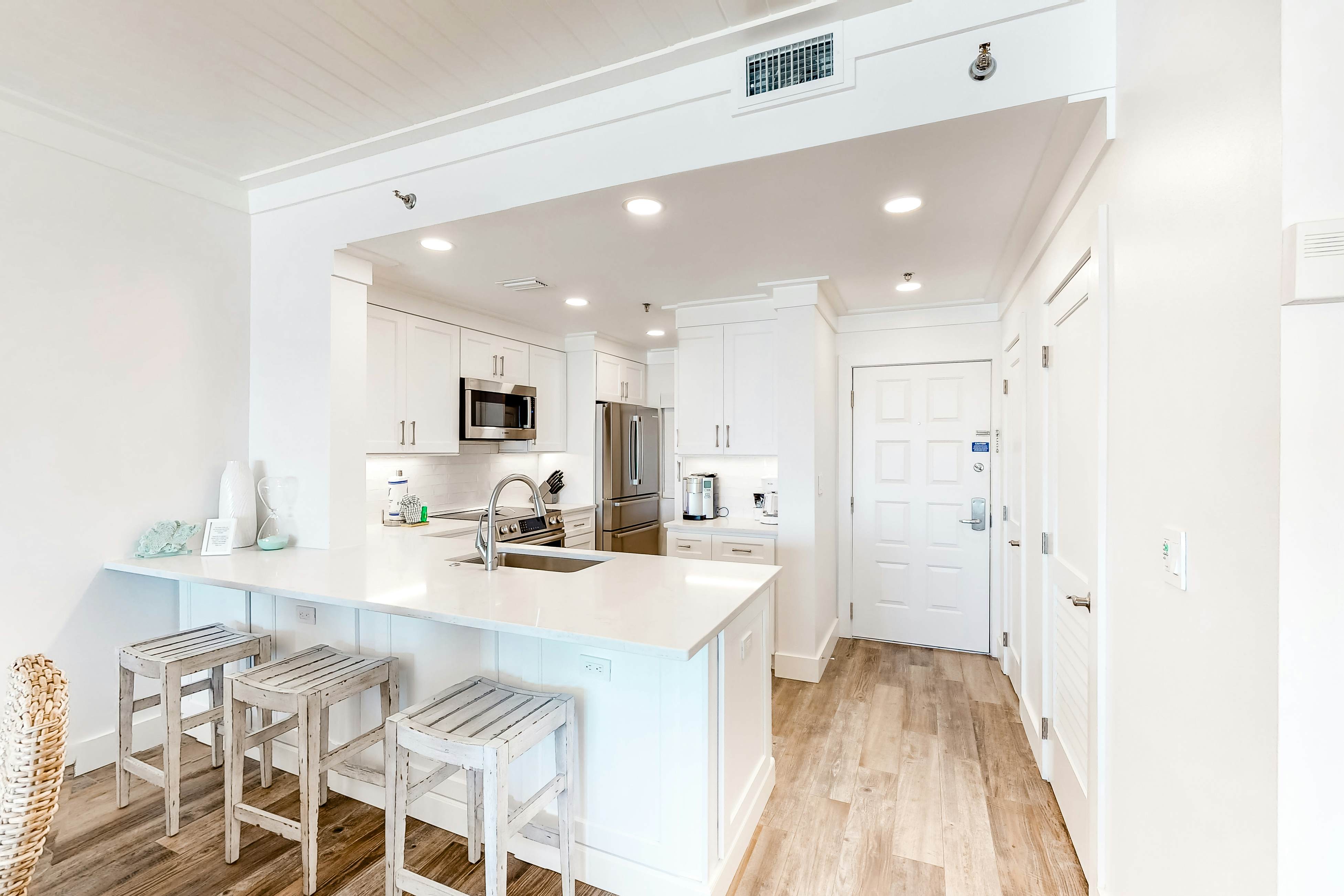 Bright Waterfront Condo with Pool and Hot Tub