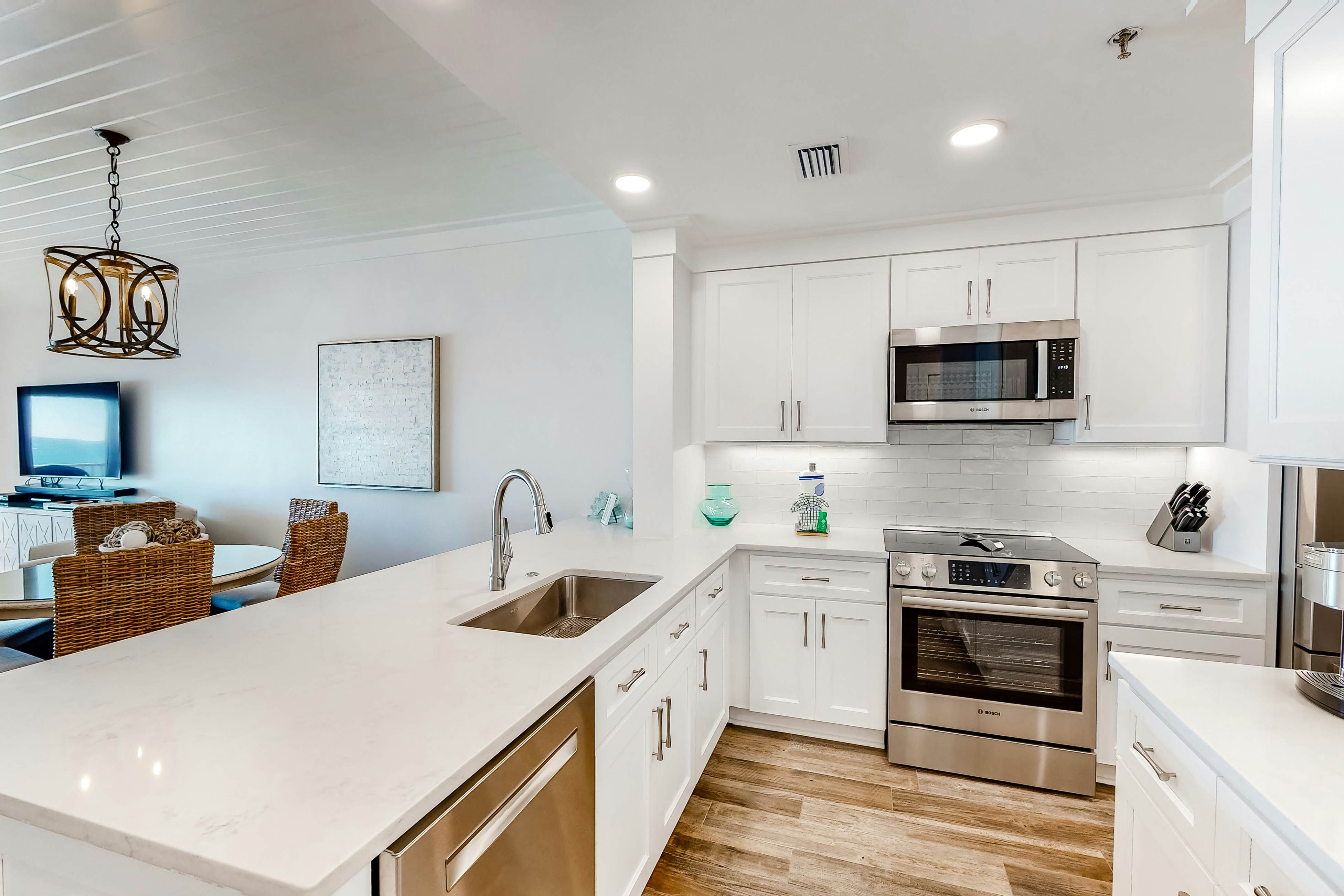 Bright Waterfront Condo with Pool and Hot Tub