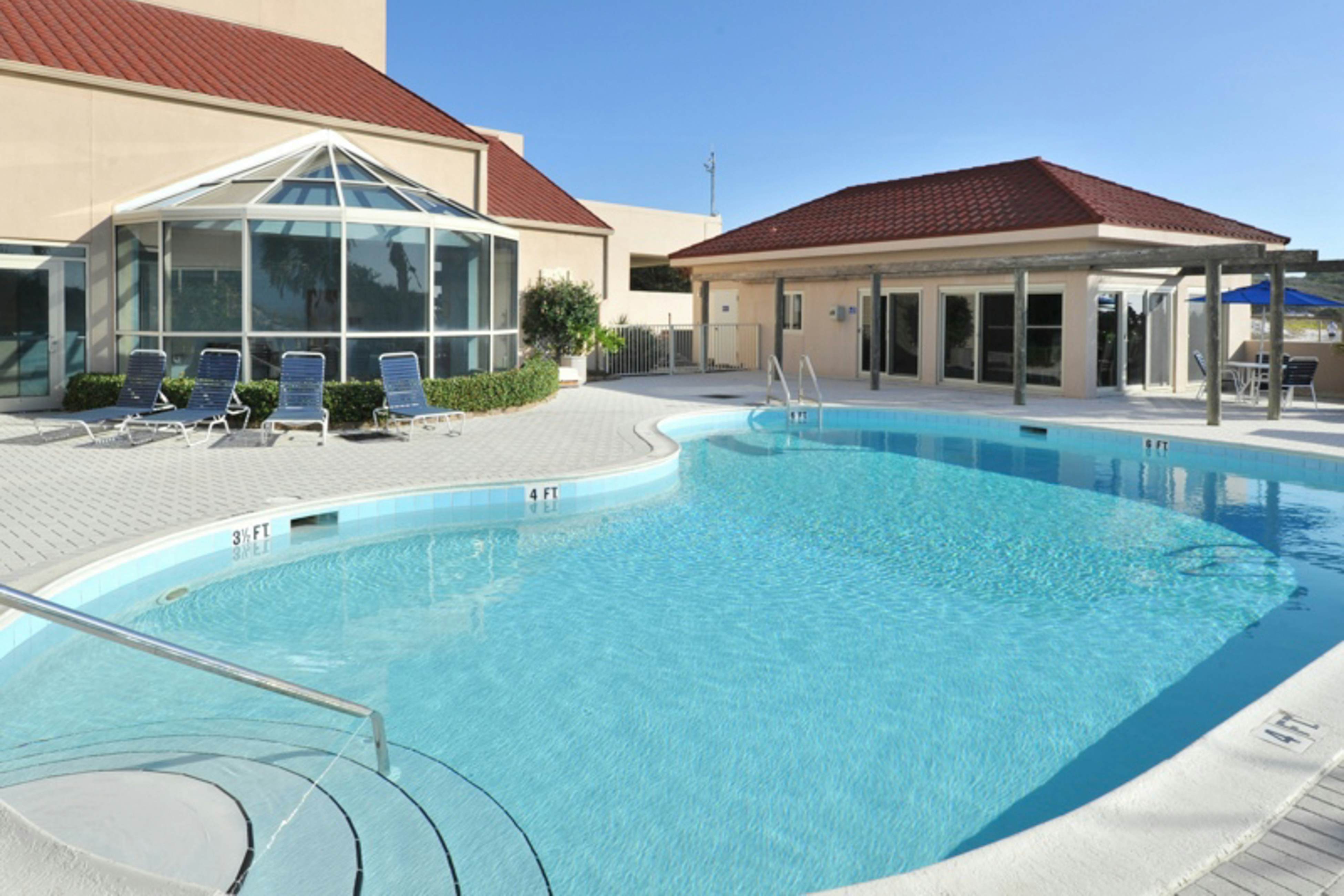 Bright Waterfront Condo with Pool and Hot Tub