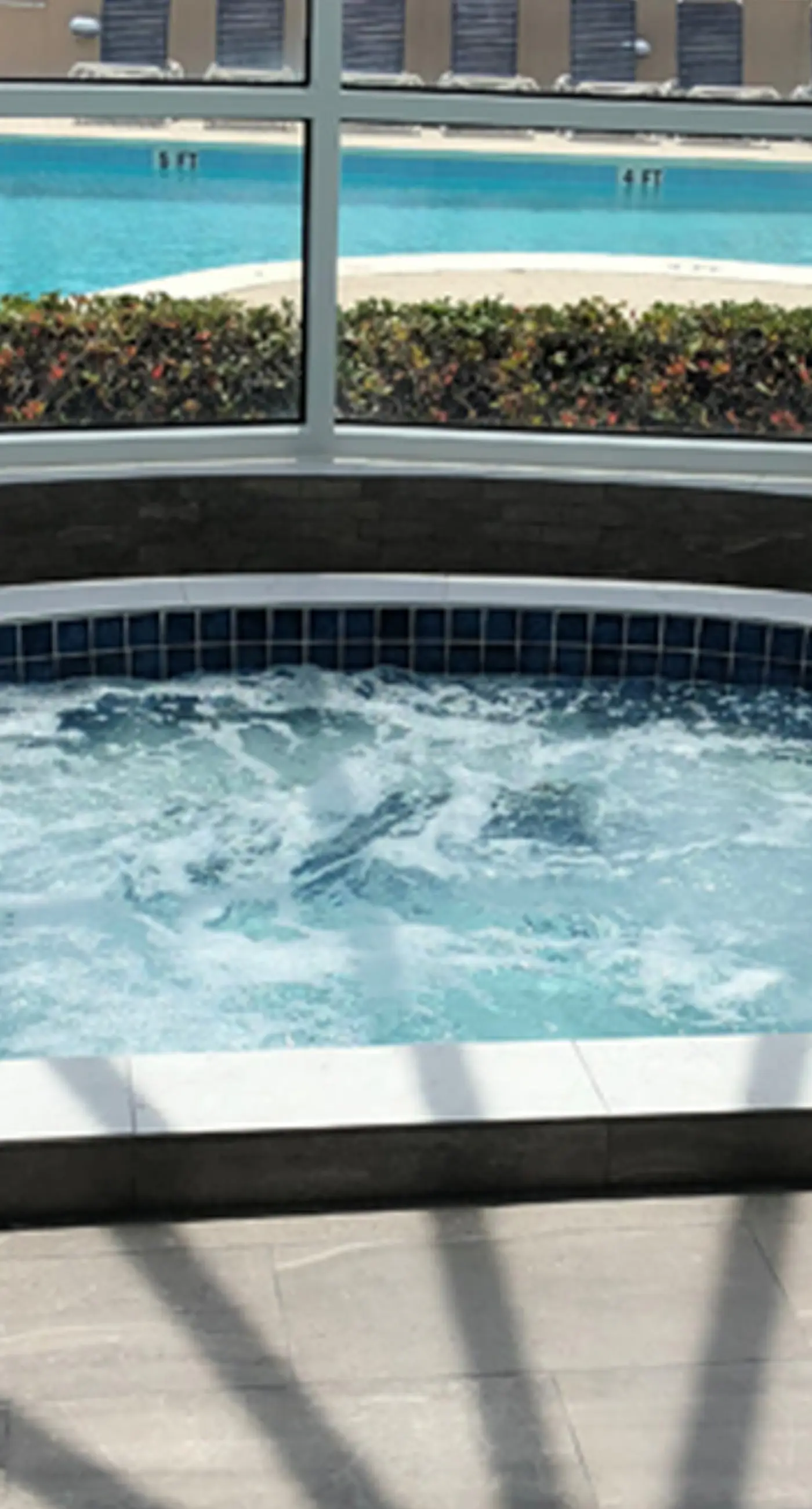 Beachfront Condo with Balcony Pool and Hot Tub