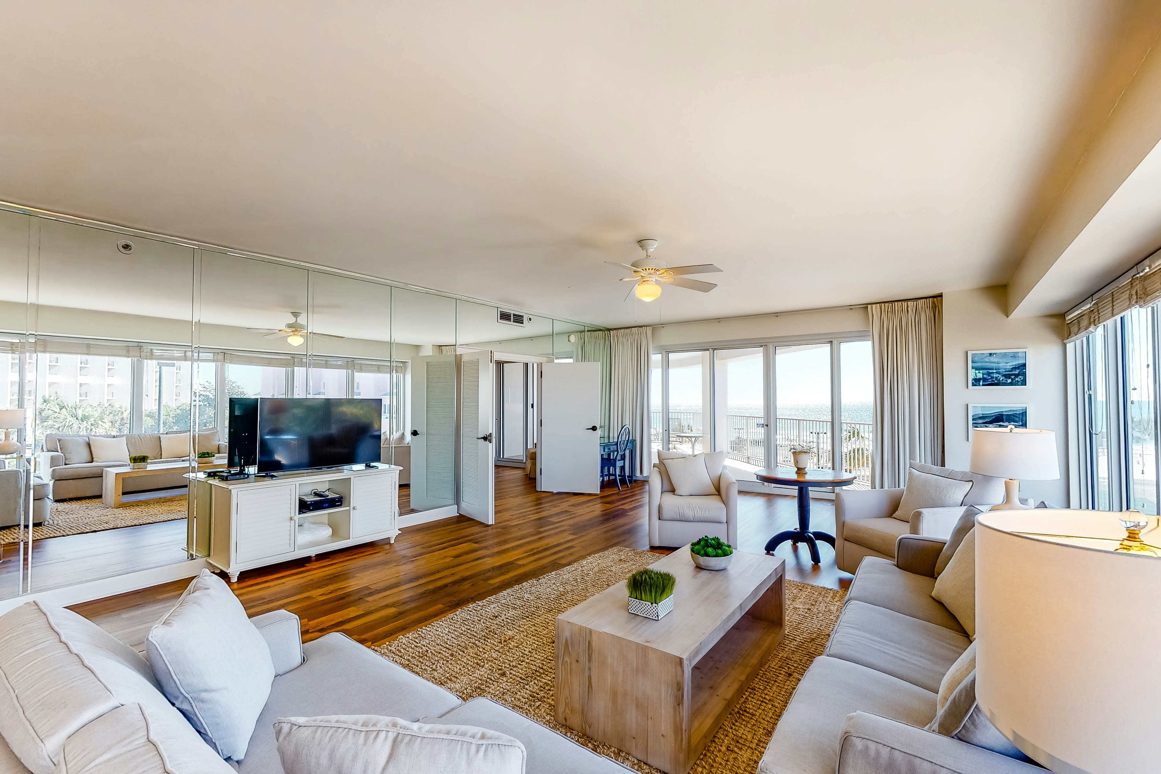 Gulf-Front Condo with Balcony Pools and Hot Tub